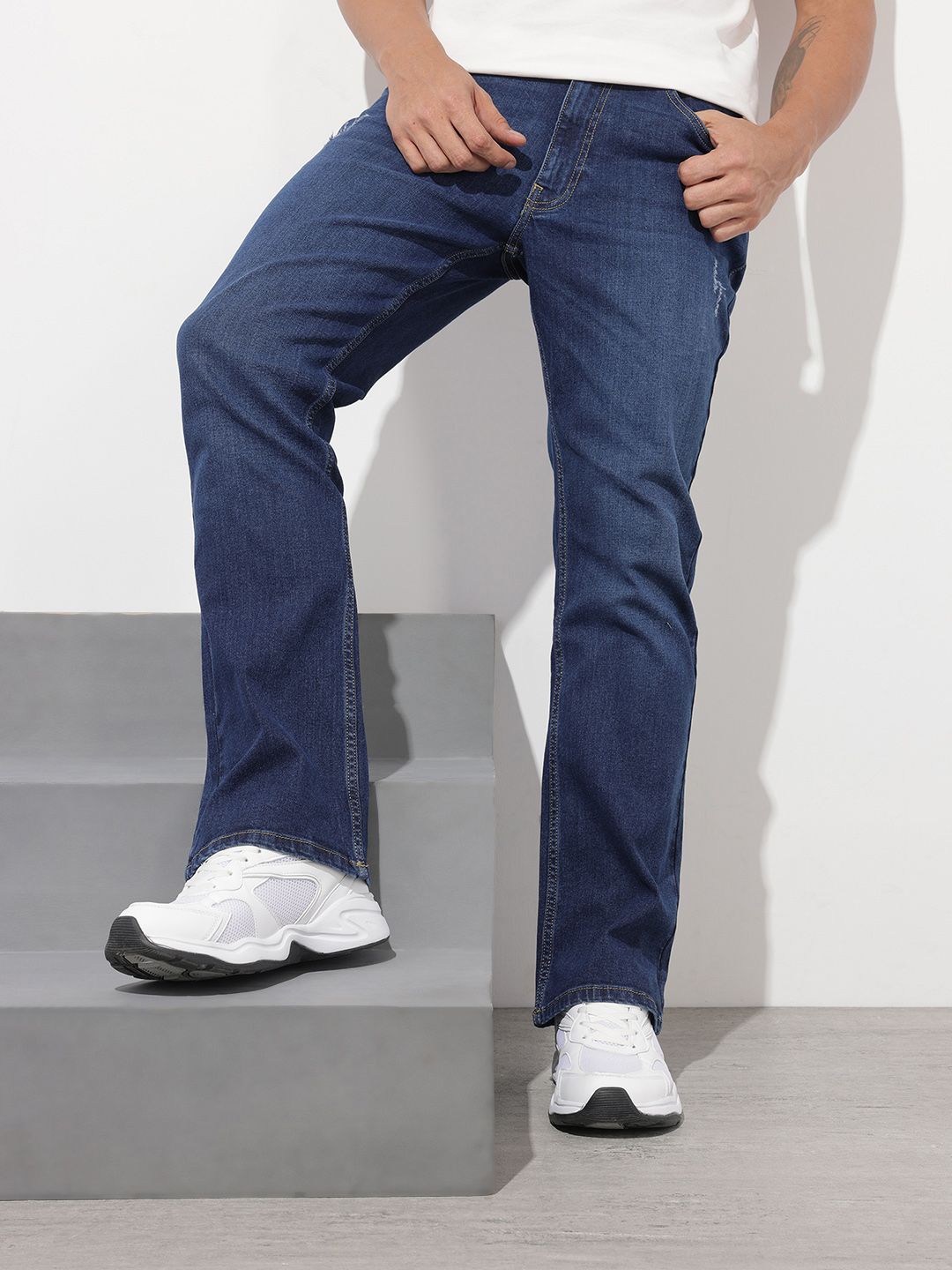 The Roadster Life Co. Men Bootcut Low Distress Light Fade Stretchable Jeans