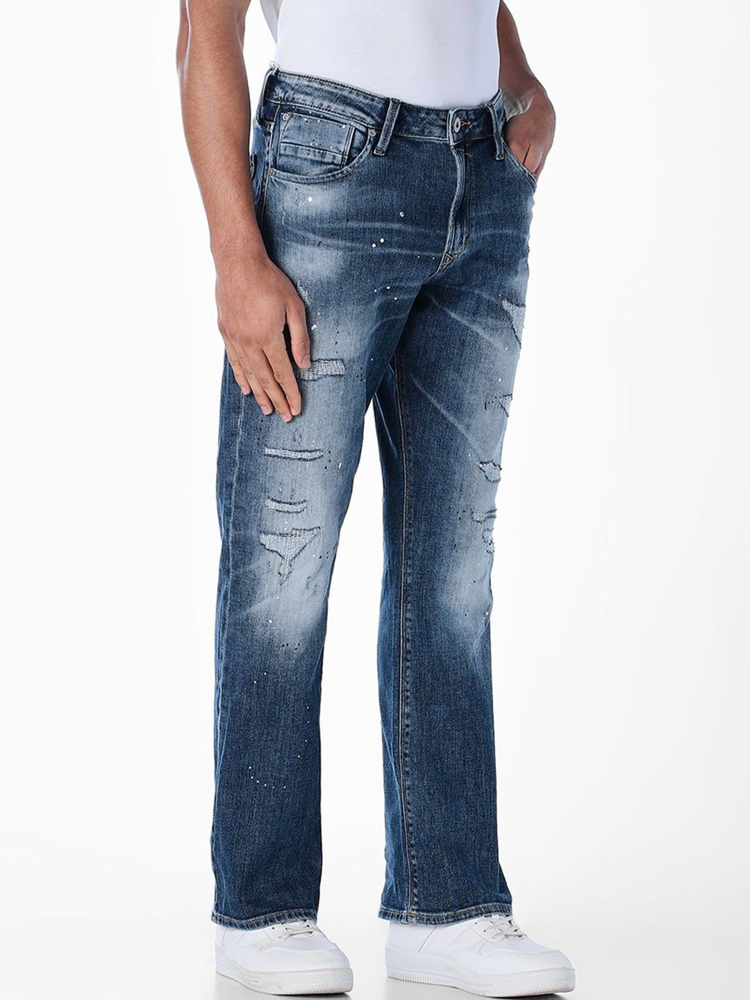 Clark Bootcut Low-Rise Highly Distressed Light Fade Stretchable Jeans