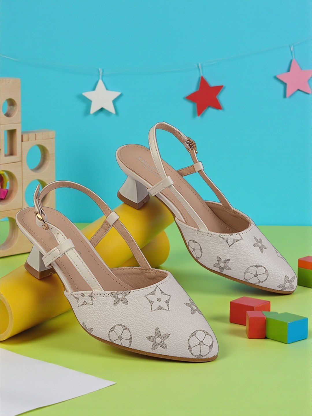 Truffle Collection Girls Printed Block Pumps deal from myntra