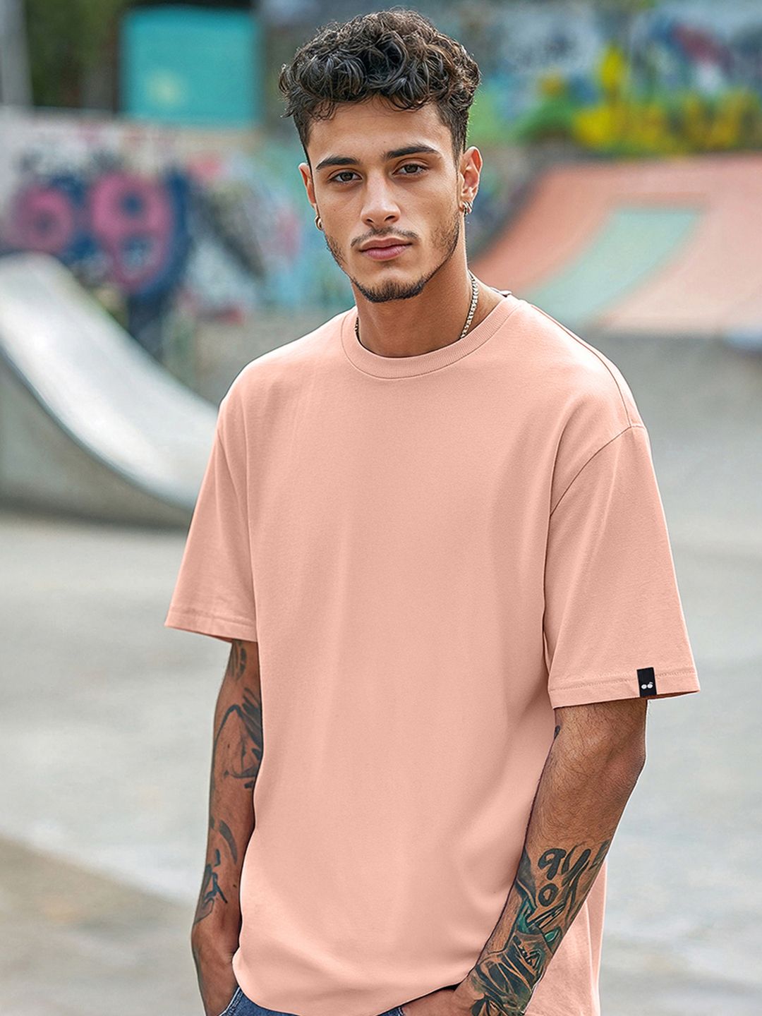 Bewakoof Men Coral Solid Round Neck Oversized Cotton T-shirt