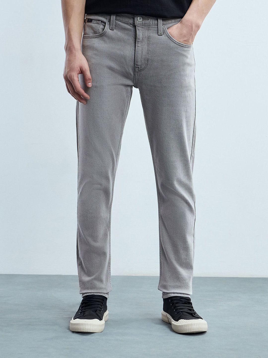 Flying Machine Men Tapered Fit Mid-Rise Light Fade Stretchable Jeans
