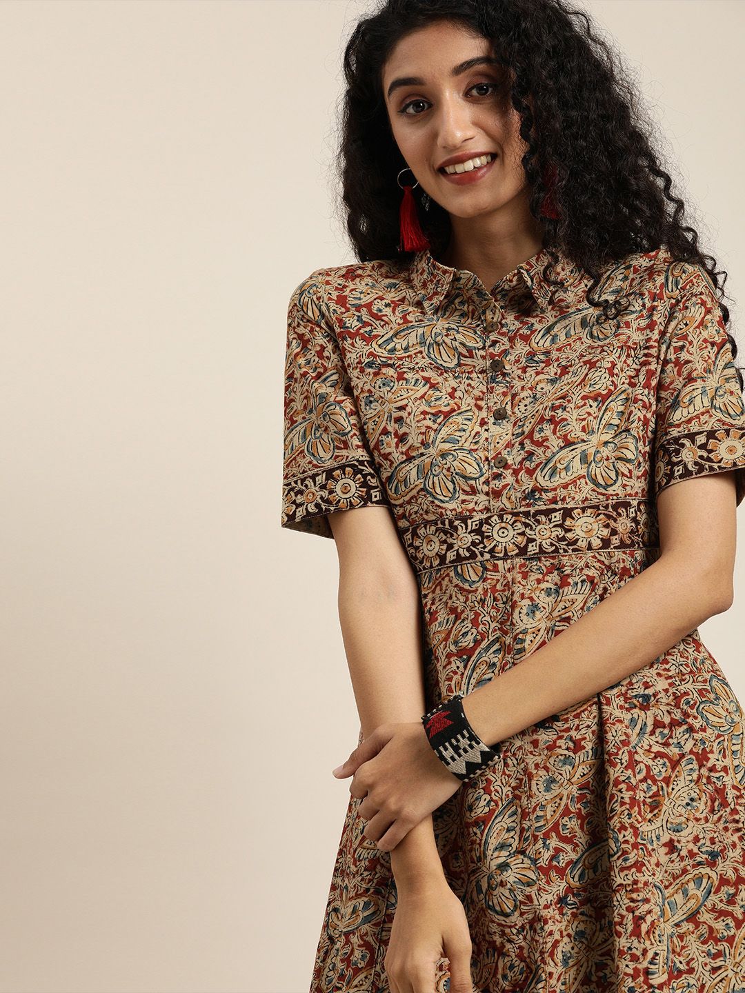 Taavi Women Beige & Red Kalamlari Hand Block Print Fit & Flare Dress with Pockets