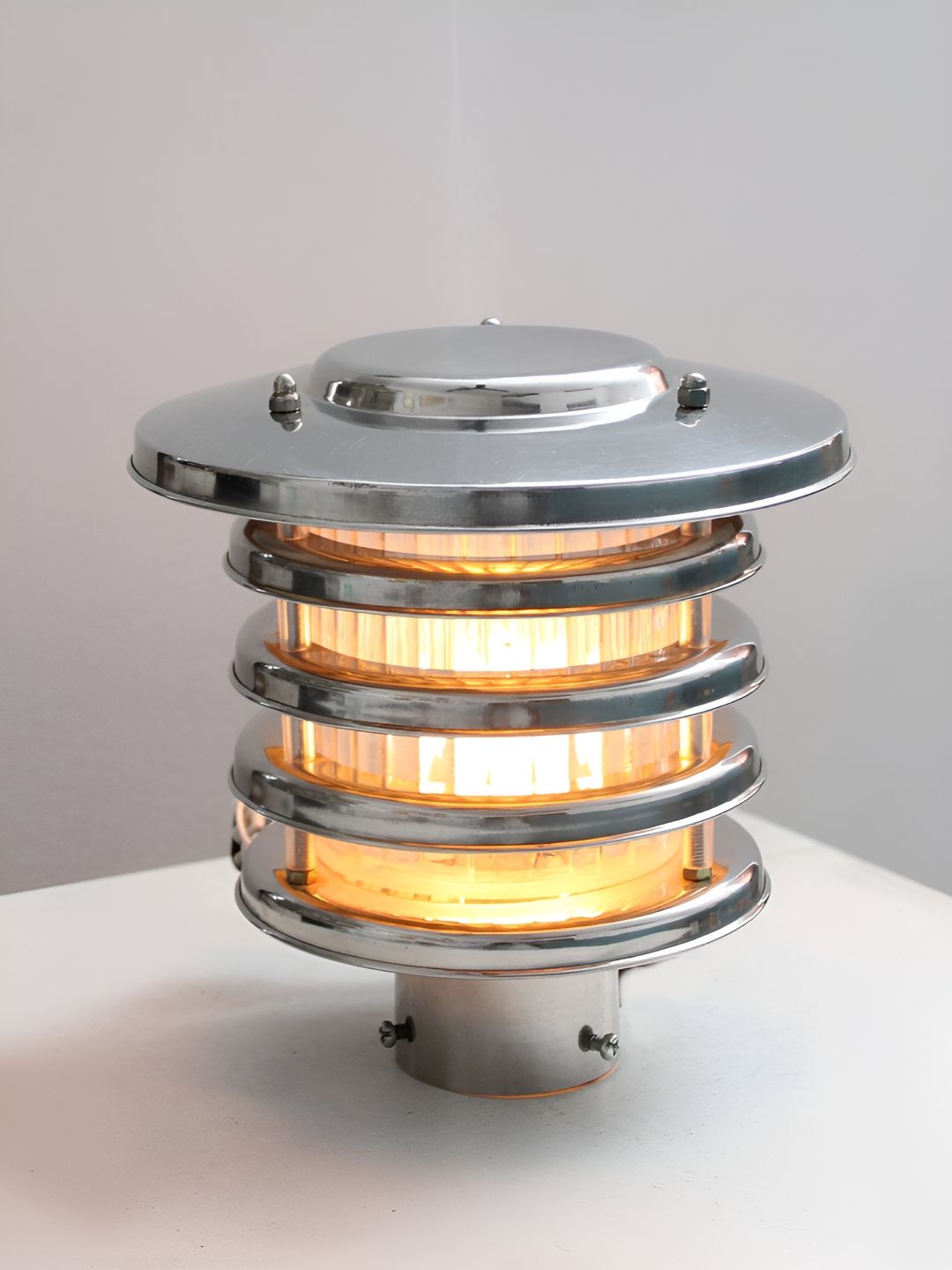 SHREE KALA HOME DECOR Silver-Toned Metal Cylinder Shaped Wall Lamp