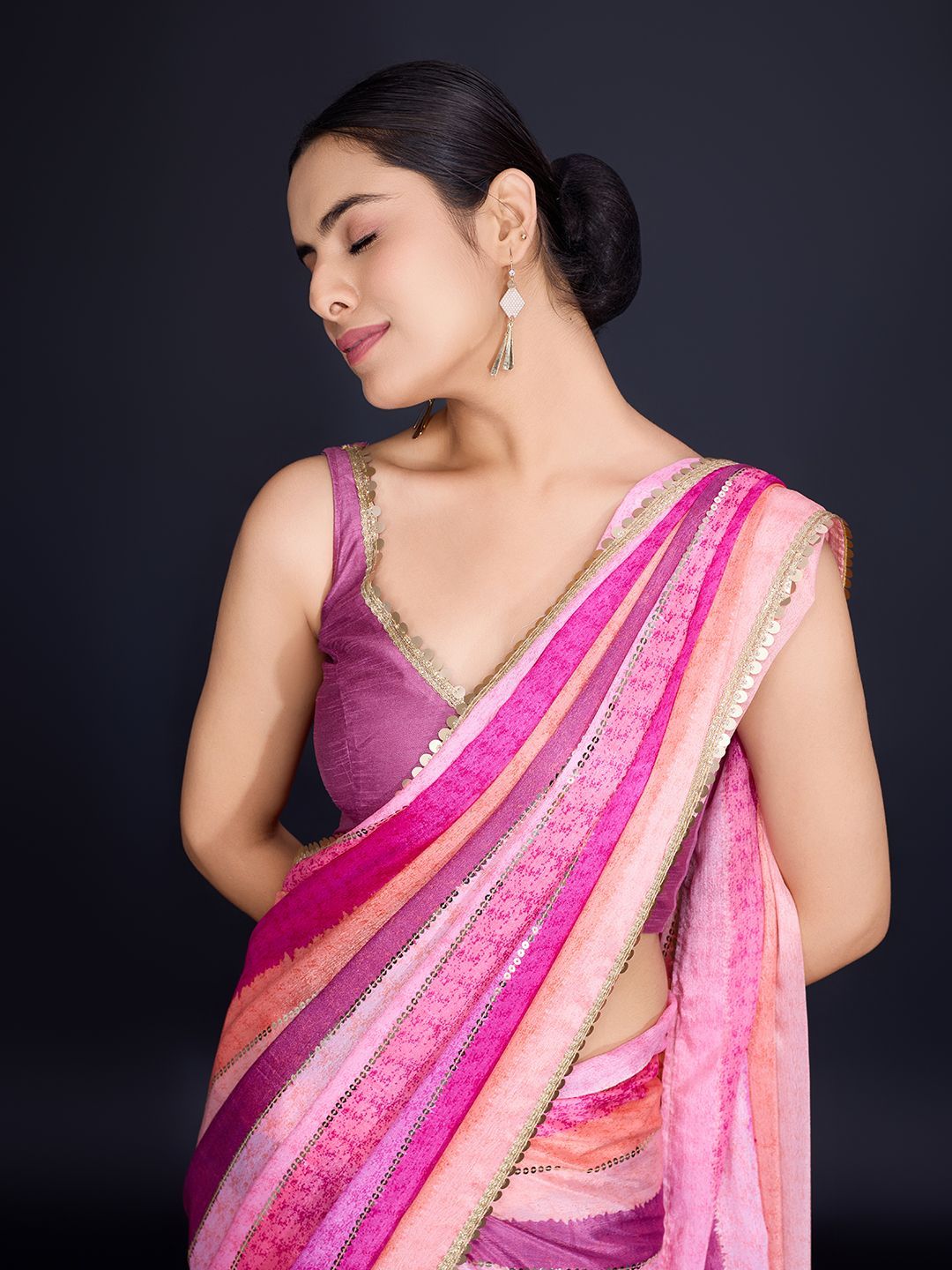 FashionsEye Leheriya Printed Sequinned Saree Price in India