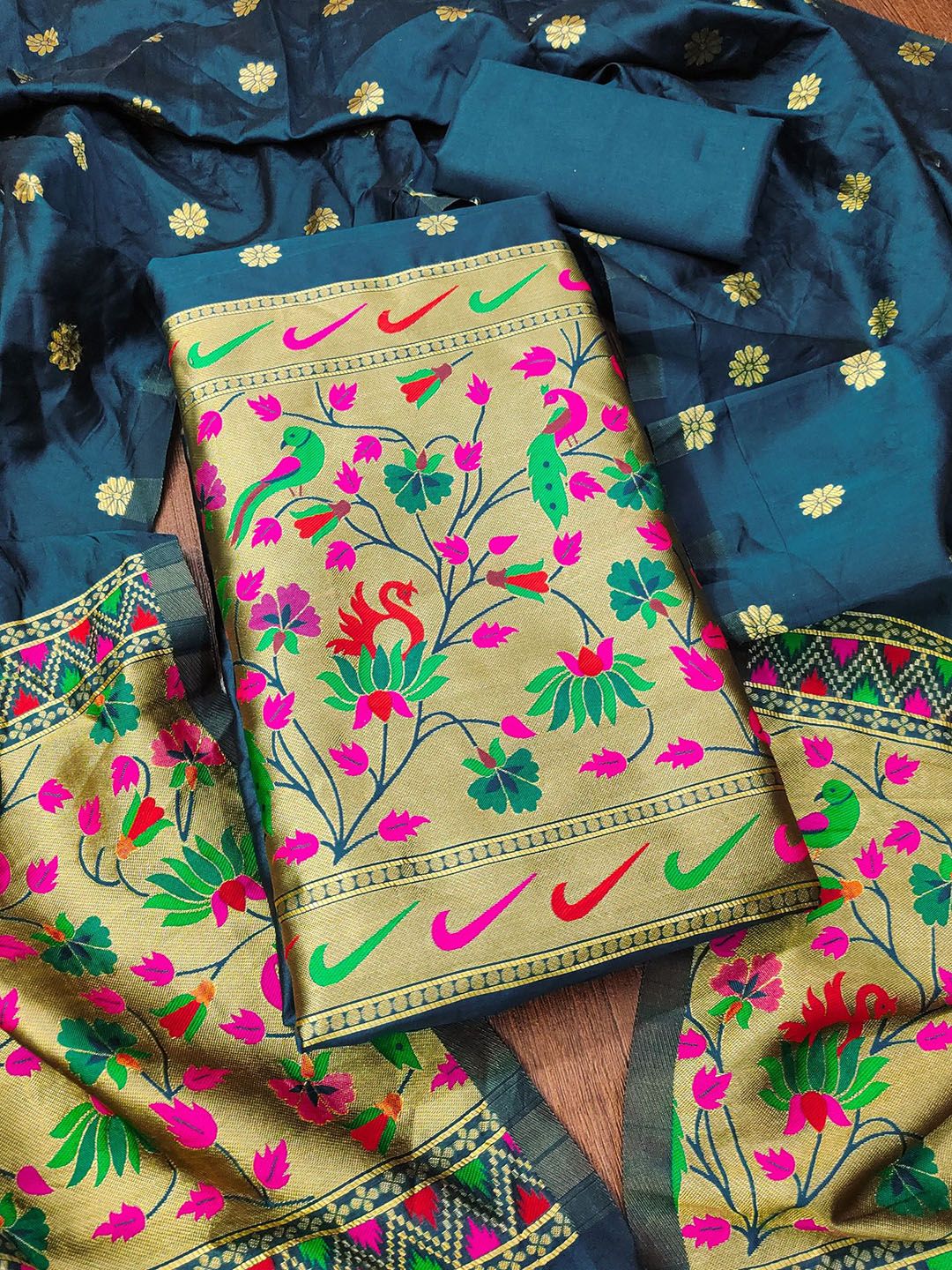 Rangtulika Ethnics Floral Woven Design Zari Tapela Silk Unstitched Dress Material