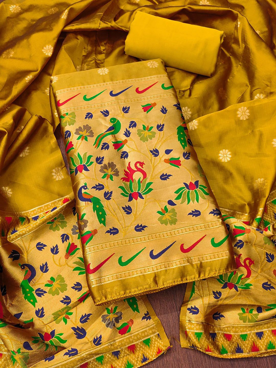 Rangtulika Ethnics Floral Woven Design Zari Tapela Silk Unstitched Dress Material