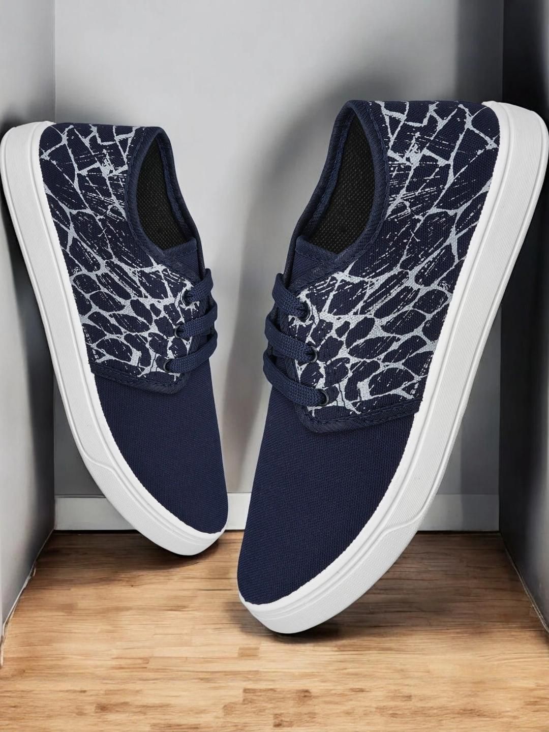 Free Kicks Men Navy Blue Canvas Marking Running Sports Shoes deal from myntra Free Kicks Men Navy Blue Canvas Marking Running Sports Shoes deal from myntra