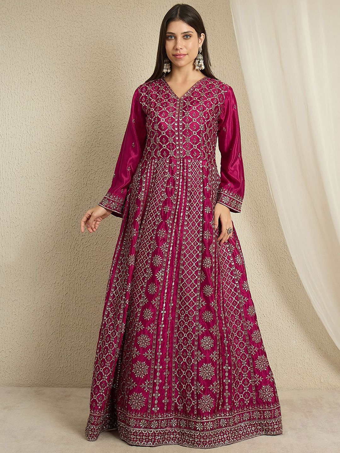 green emerald velvet dress A sophisticated long black dress showcasing subtle floral embroidery  Samant  Chauhan