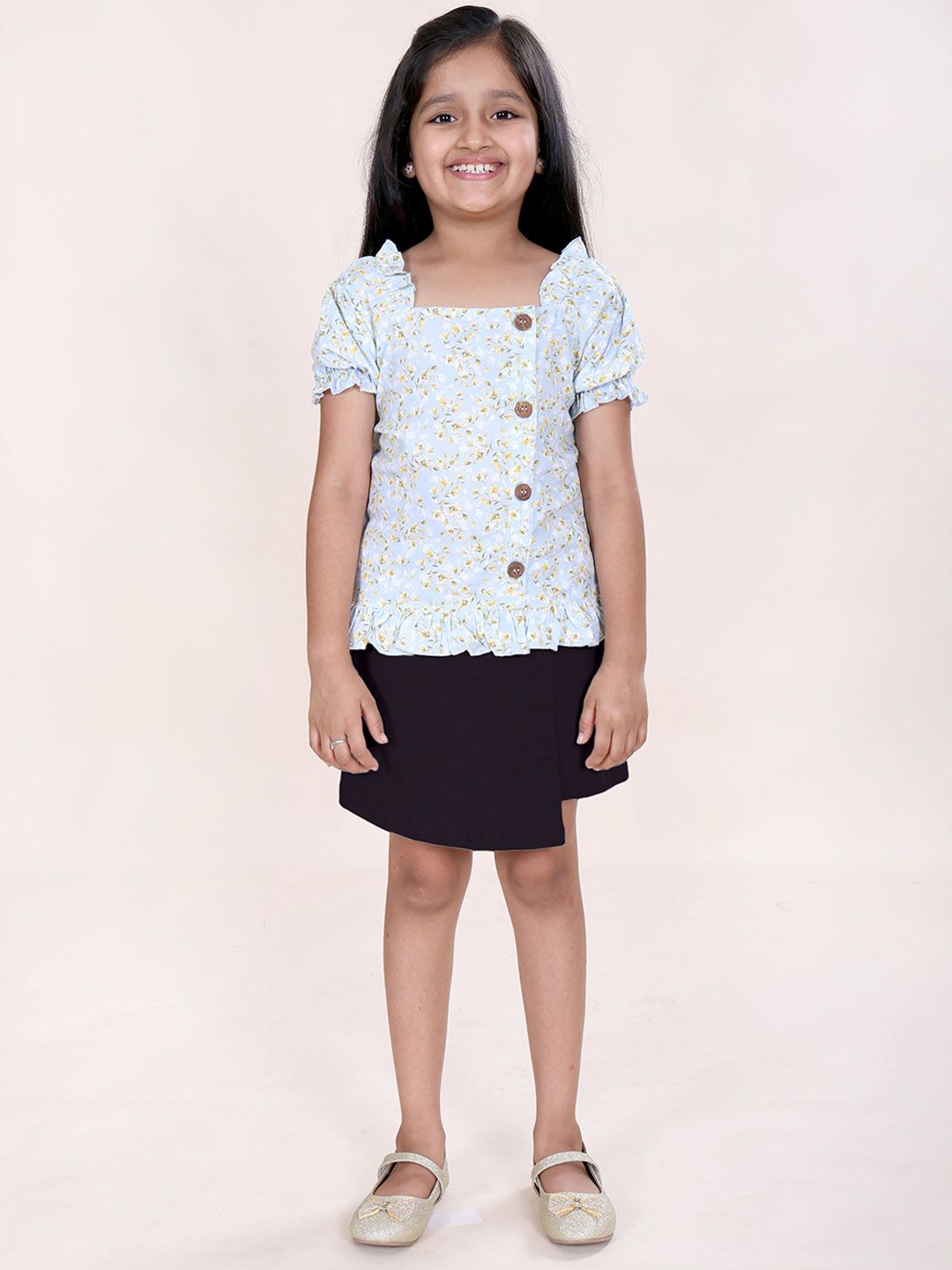 KiddoPanti Girls Printed Top With Puff Sleeve & Over Lap Skort Clothing Set