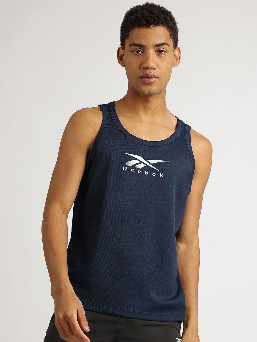 Reebok Men Solid Round Neck T-shirt