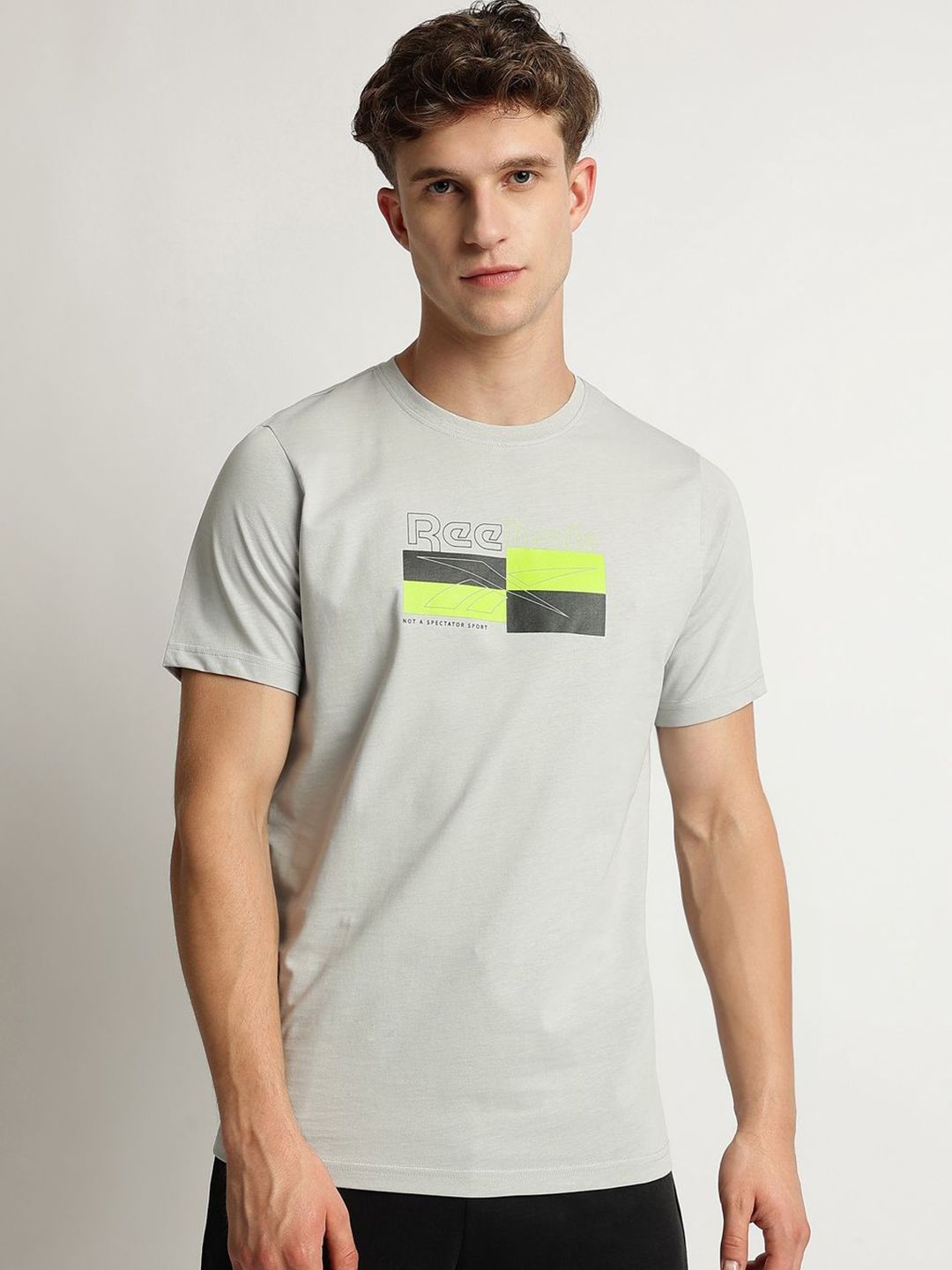 Reebok Men Solid Round Neck Pure Cotton T-shirt