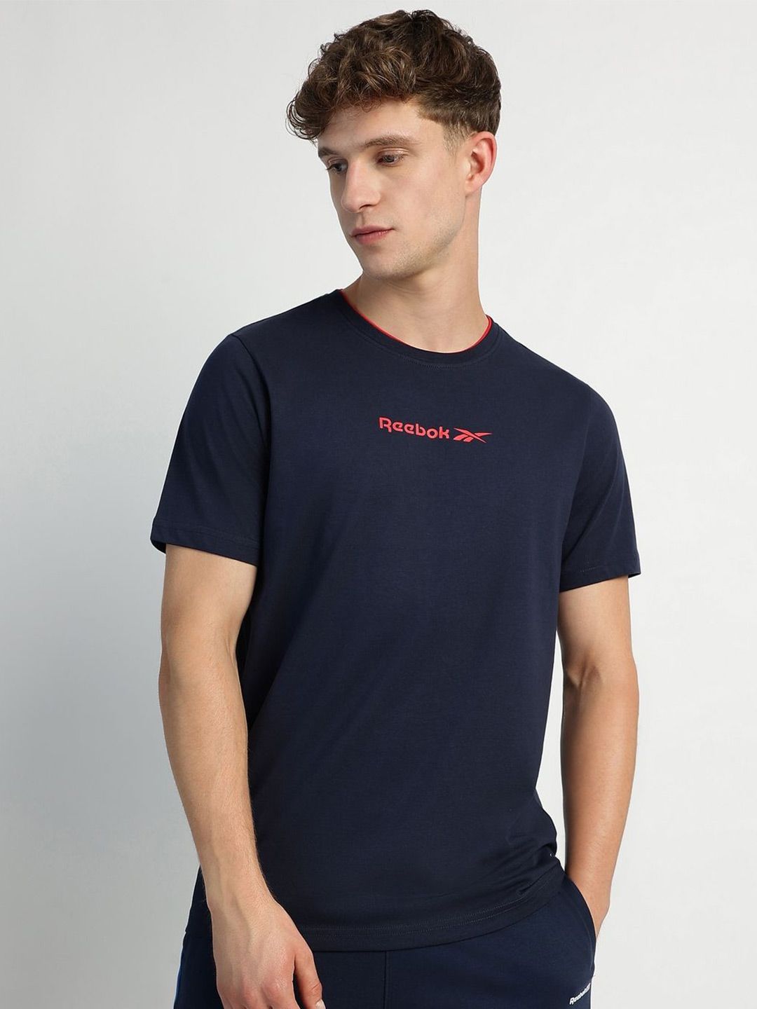Reebok Men Solid Round Neck Pure Cotton T-shirt