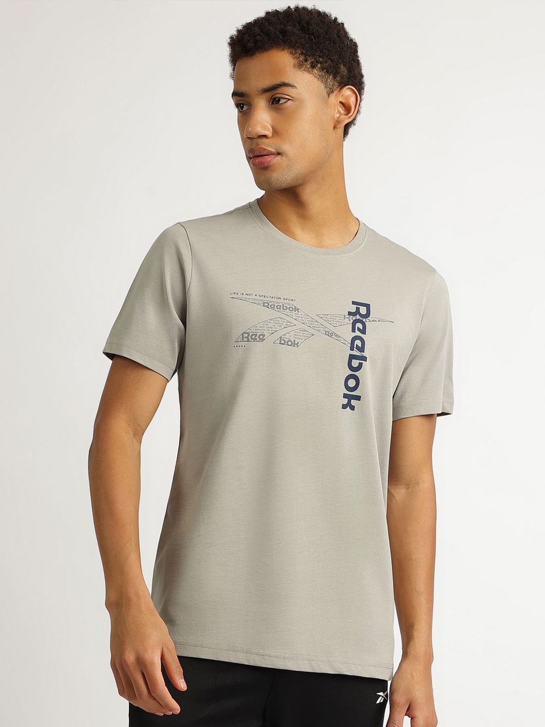 Reebok Men Solid Round Neck Pure Cotton T-shirt