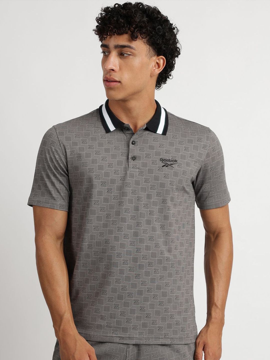 Reebok Men Solid Polo Collar Cotton T-shirt