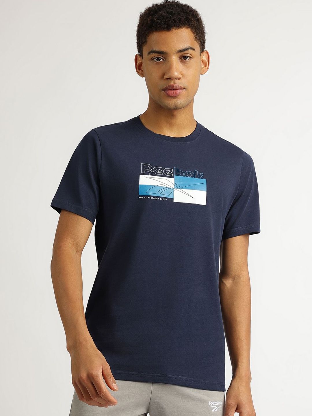 Reebok Men Solid Round Neck Pure Cotton T-shirt