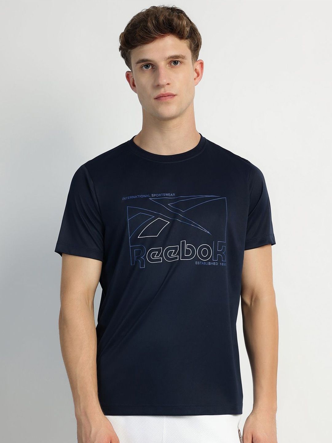 Reebok Men Solid Round Neck T-shirt