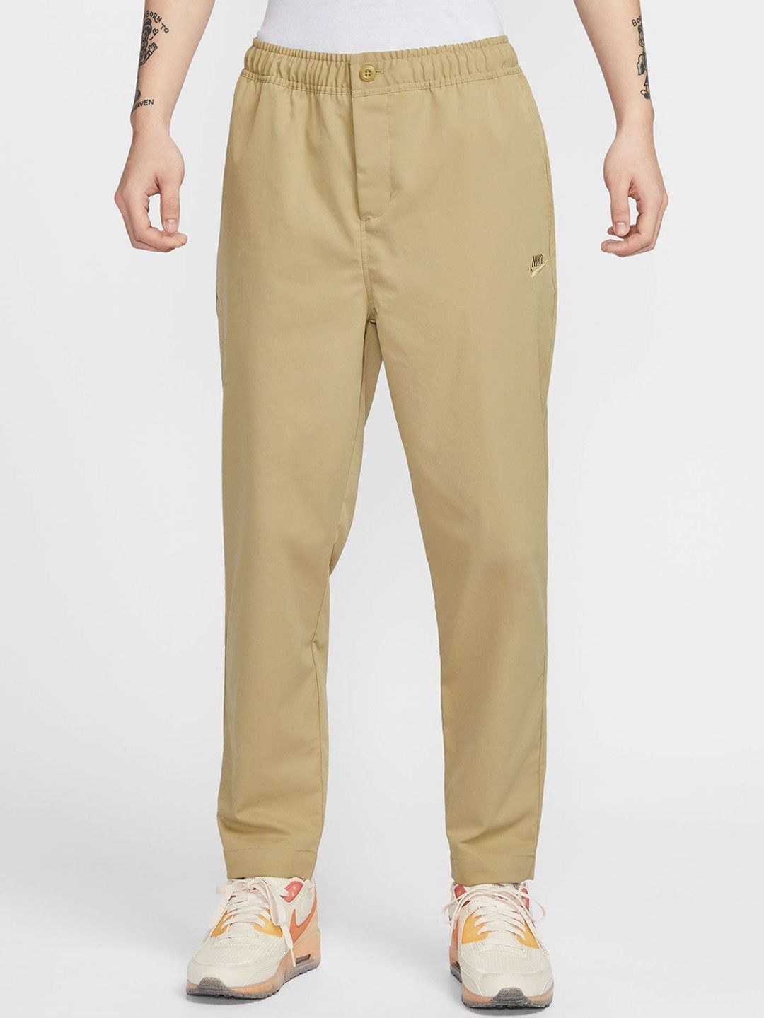 Buy Nike Club Men Tapered Fit Easy Wash Trousers - Trousers for