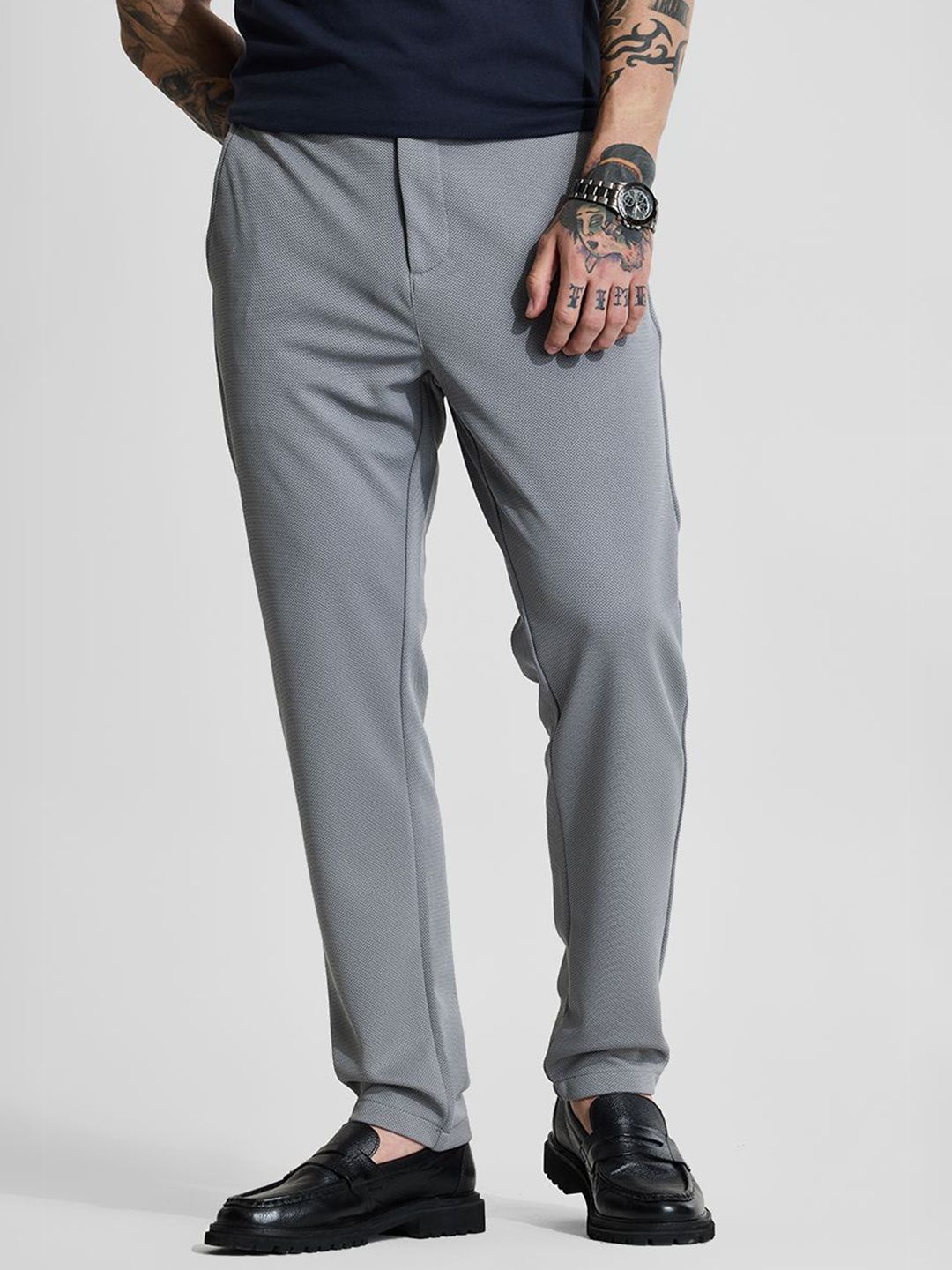 Snitch Men Grey Mid-Rise Slim Fit Trouser deal from myntra