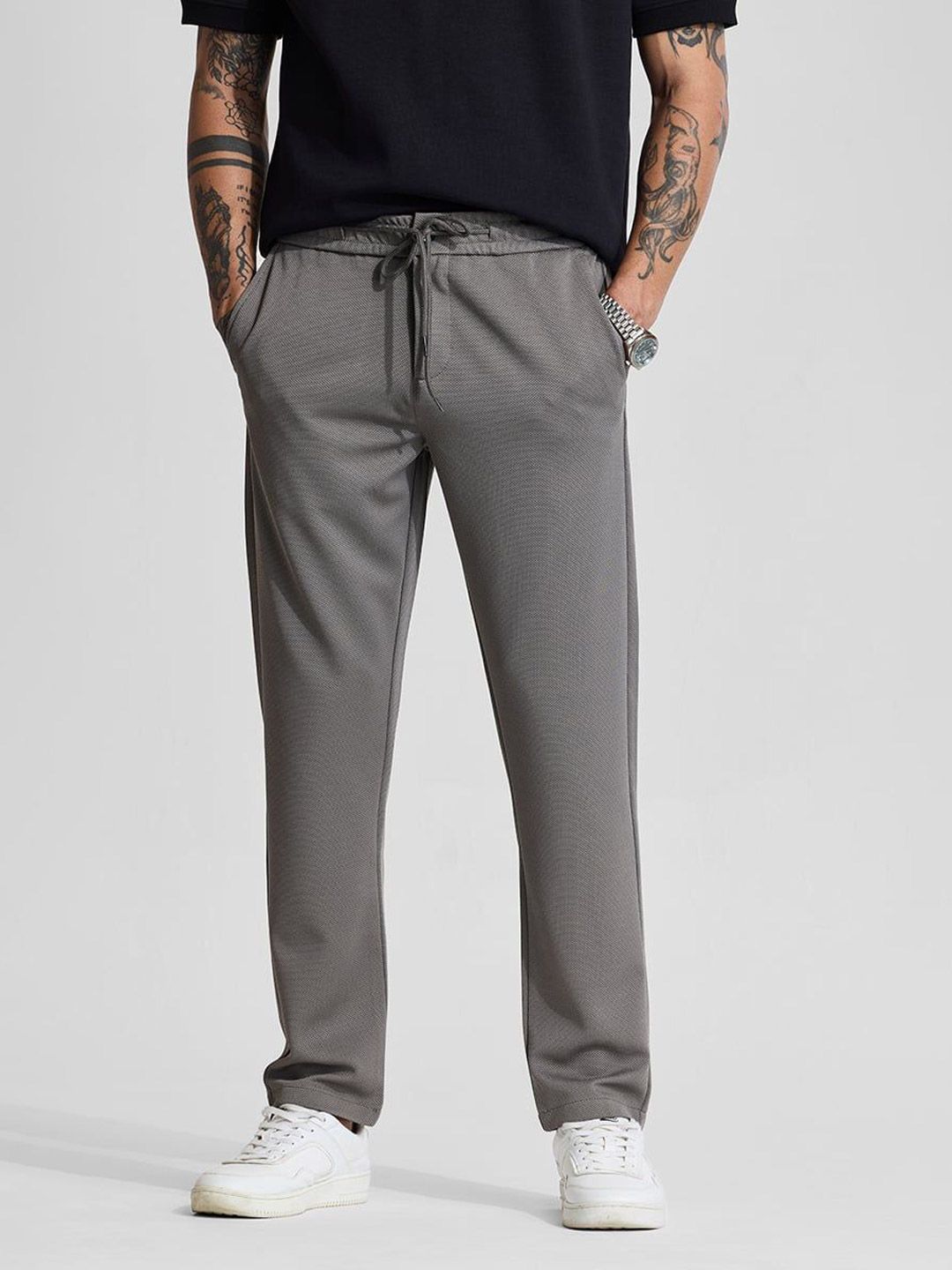 Snitch Men Slim Fit Trousers deal from myntra