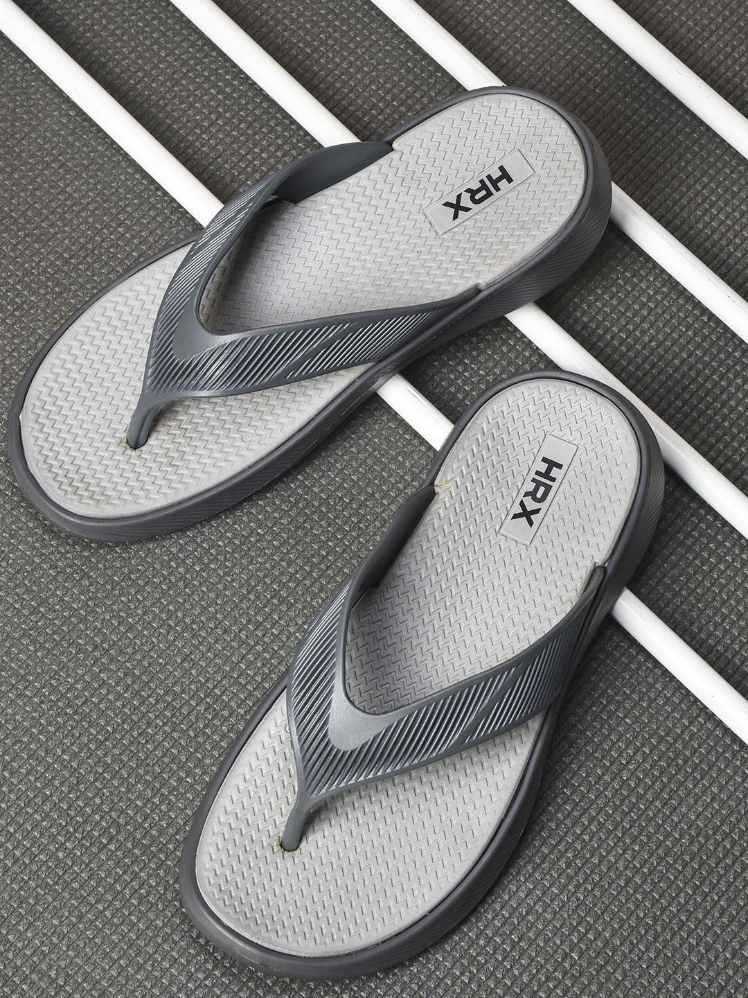 Buy HRX by Hrithik Roshan Men Rubber Thong Flip-Flops - Flip Flops