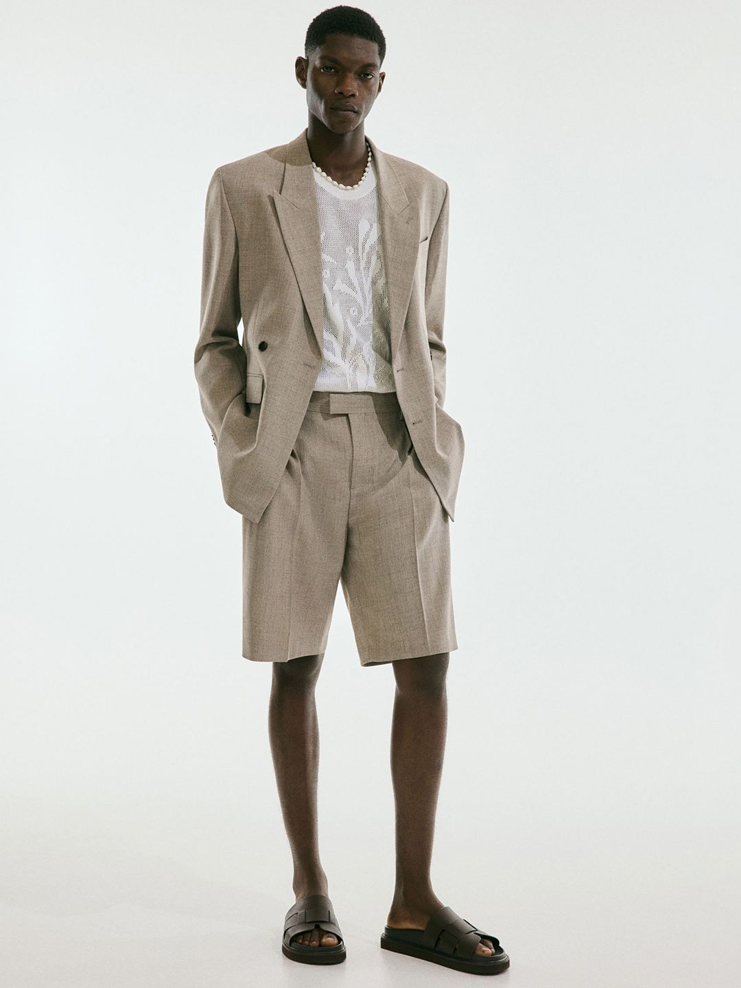 H&M Loose Fit Tailored Shorts deal from myntra
