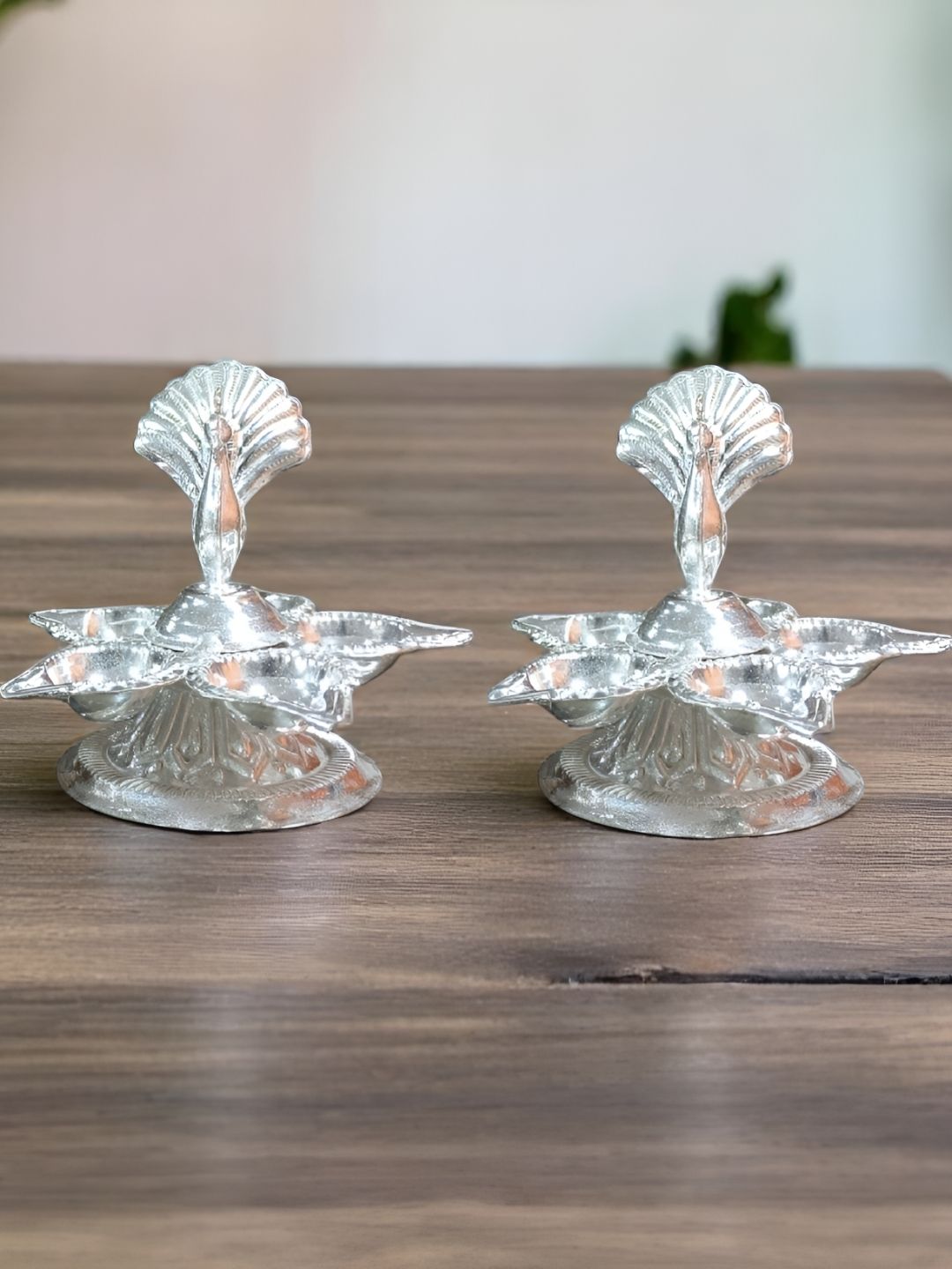 Sigaram 2-Pcs Silver-Toned Panchmukhi Diya With Peacock Handle