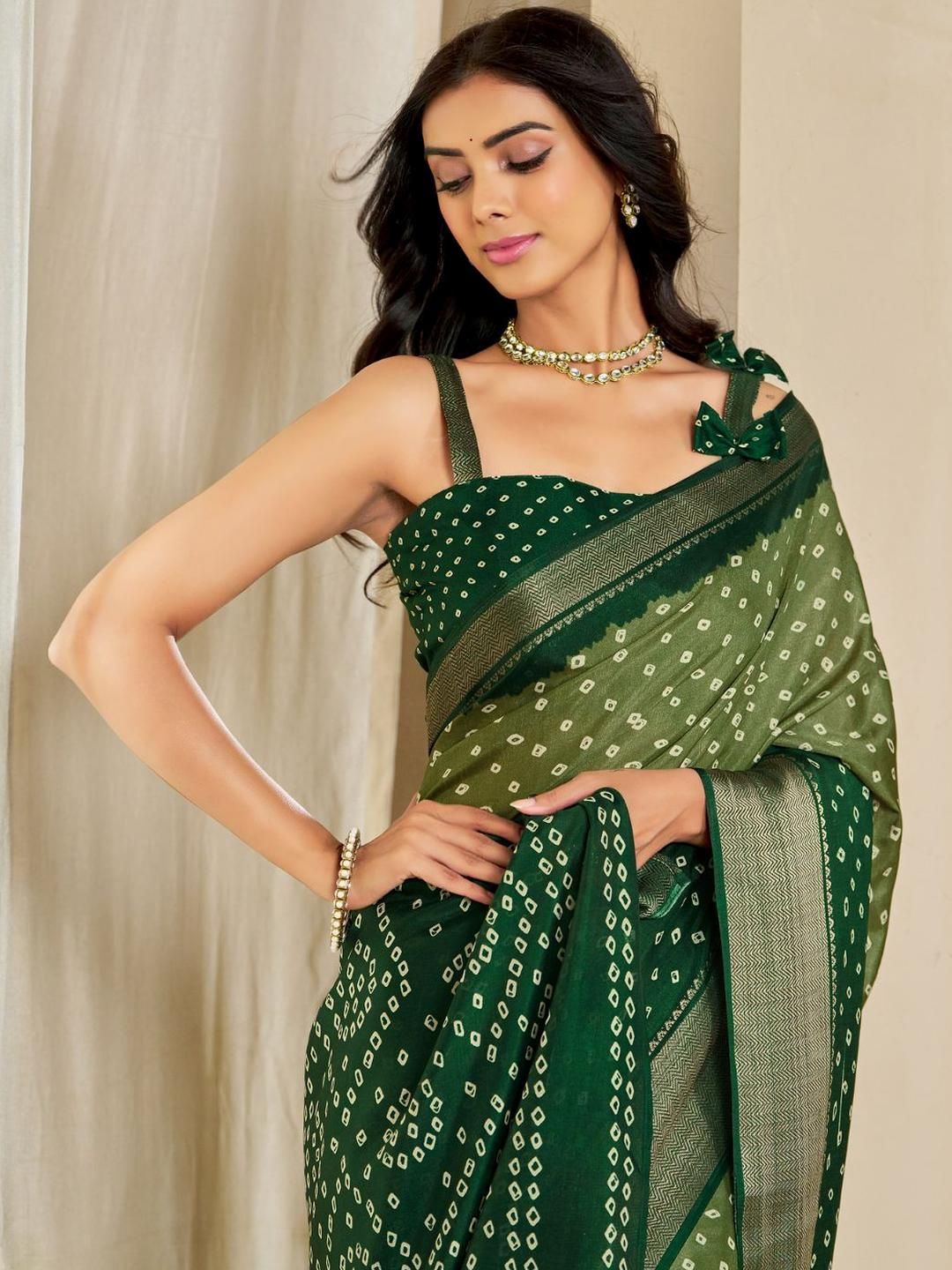 Kalini Women Dola Silk Bandhani Print Zari border Saree Price in India