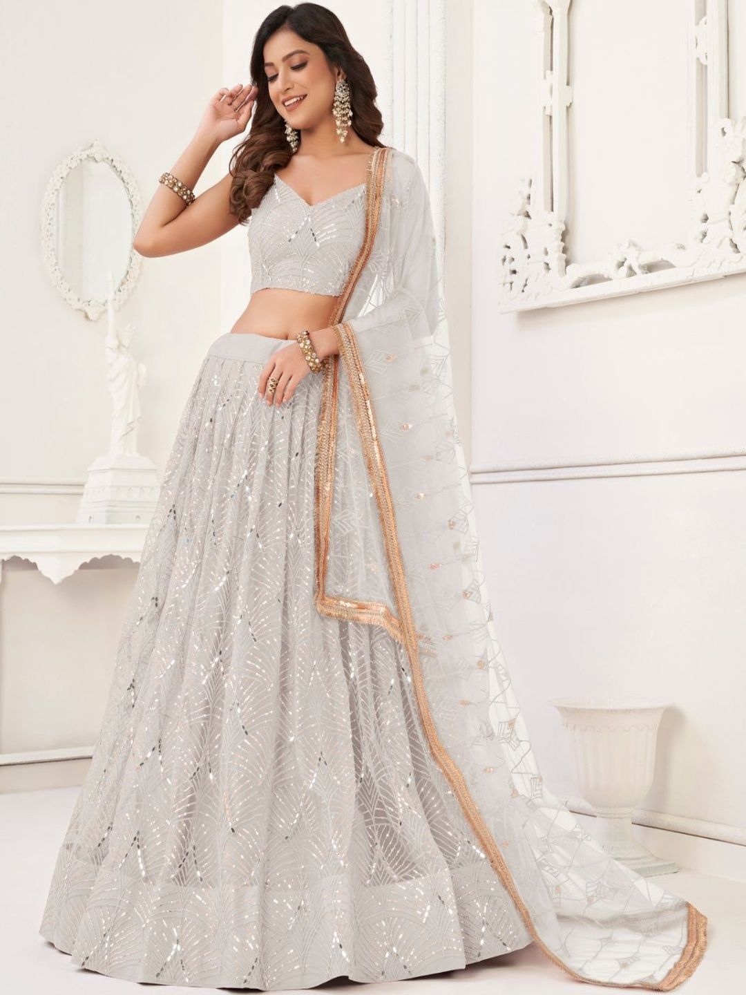 EthniQlo Off White Net Lehenga Choli In Sequins Work