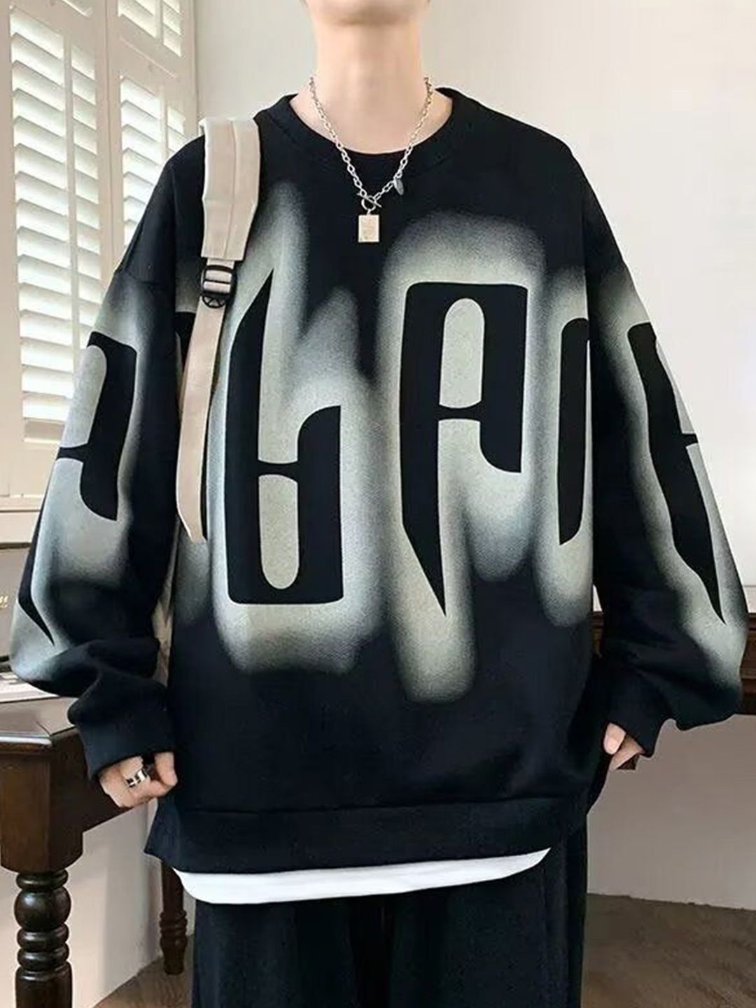 StyleCast x Revolte Printed Round Neck Drop-Shoulder Sleeves Oversized Sweatshirt