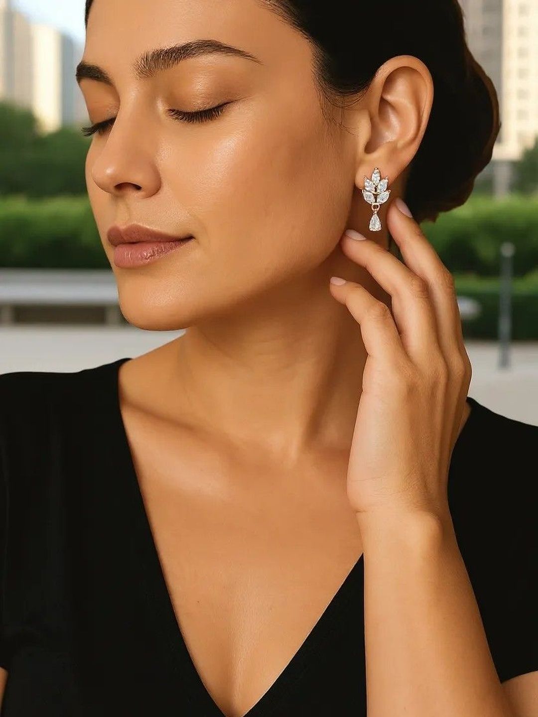 Nilu's Collection Rose Gold Plated American Diamond Studded Teardrop Shaped Drop Earrings
