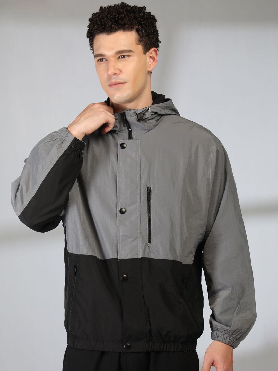 Buy Mast & Harbour Men Hooded Colourblocked Windcheater Tailored