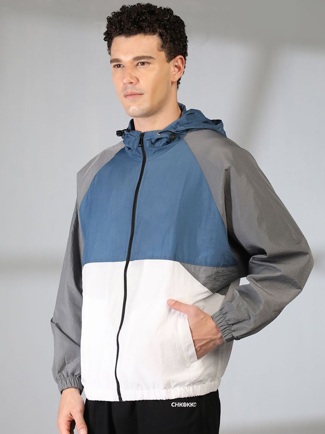 Buy Mast & Harbour Men Hooded Colourblocked Windcheater Tailored