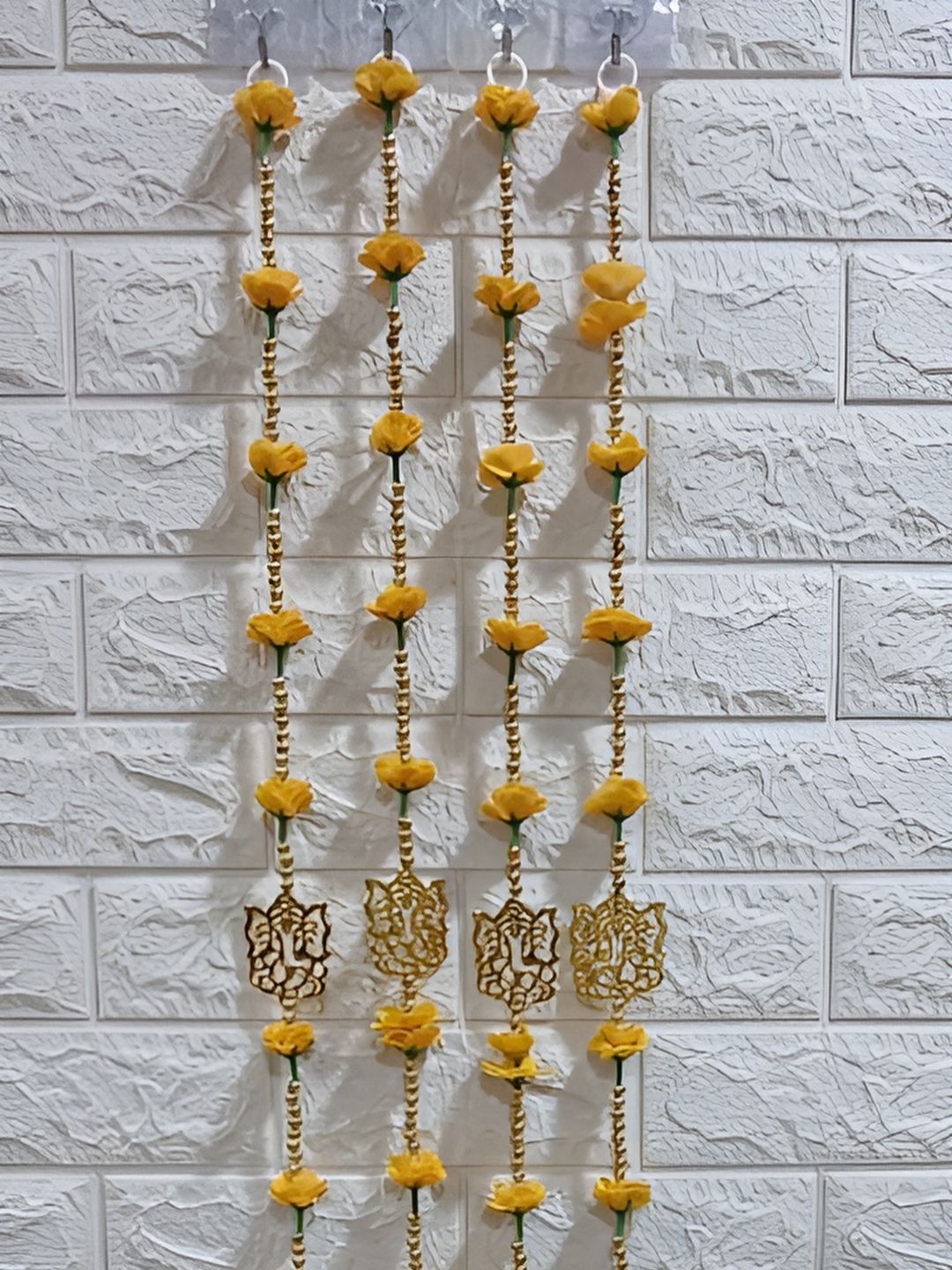 Sellplus Yellow & Gold-Toned 4 Pcs Pompom Toran Wall Hangings
