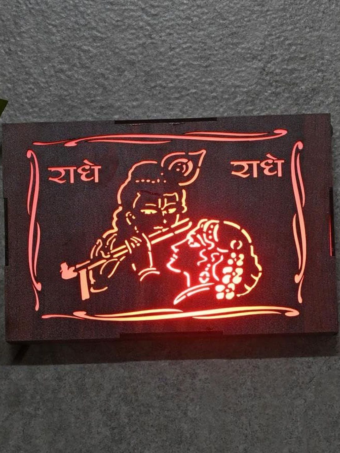 1ST TIME Brown Radhe Krishna Textured Wood Rectangle Shaped Wall Lamp