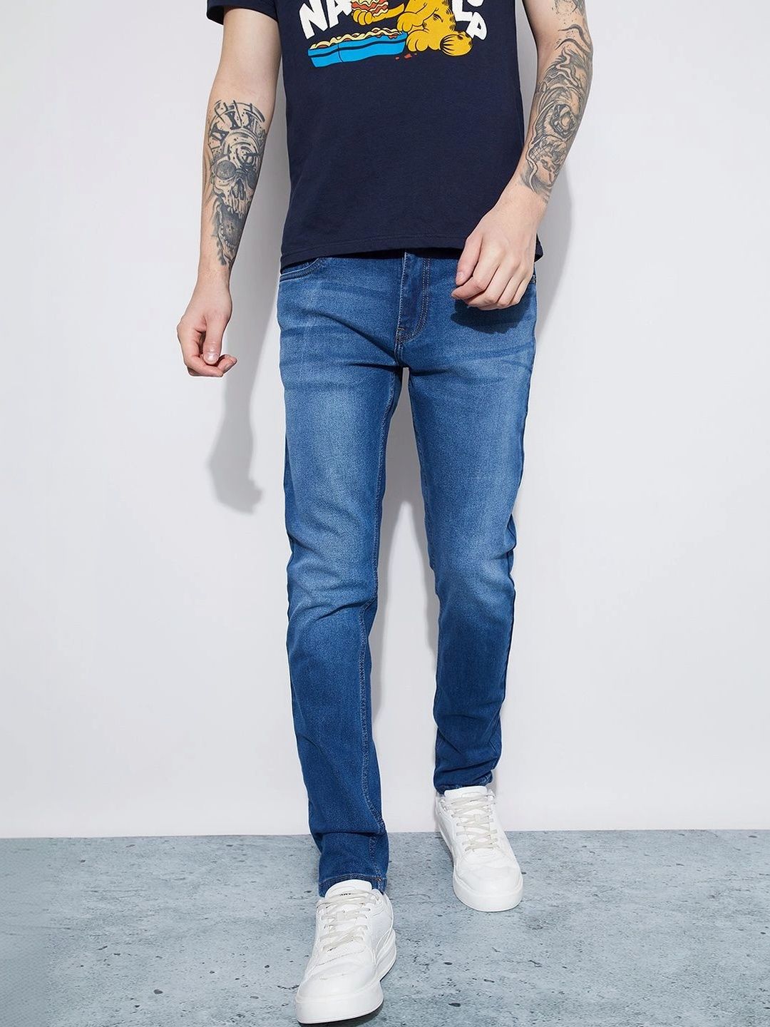 Fame Forever by Lifestyle Men Tapered Fit Mid-Rise Low Distress Stretchable Jeans
