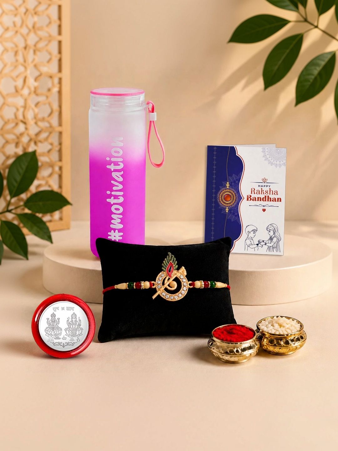 Myntra Elegant Homes Rakhi With Greeting Card Water Bottle Silver Coin & Roli Chawal