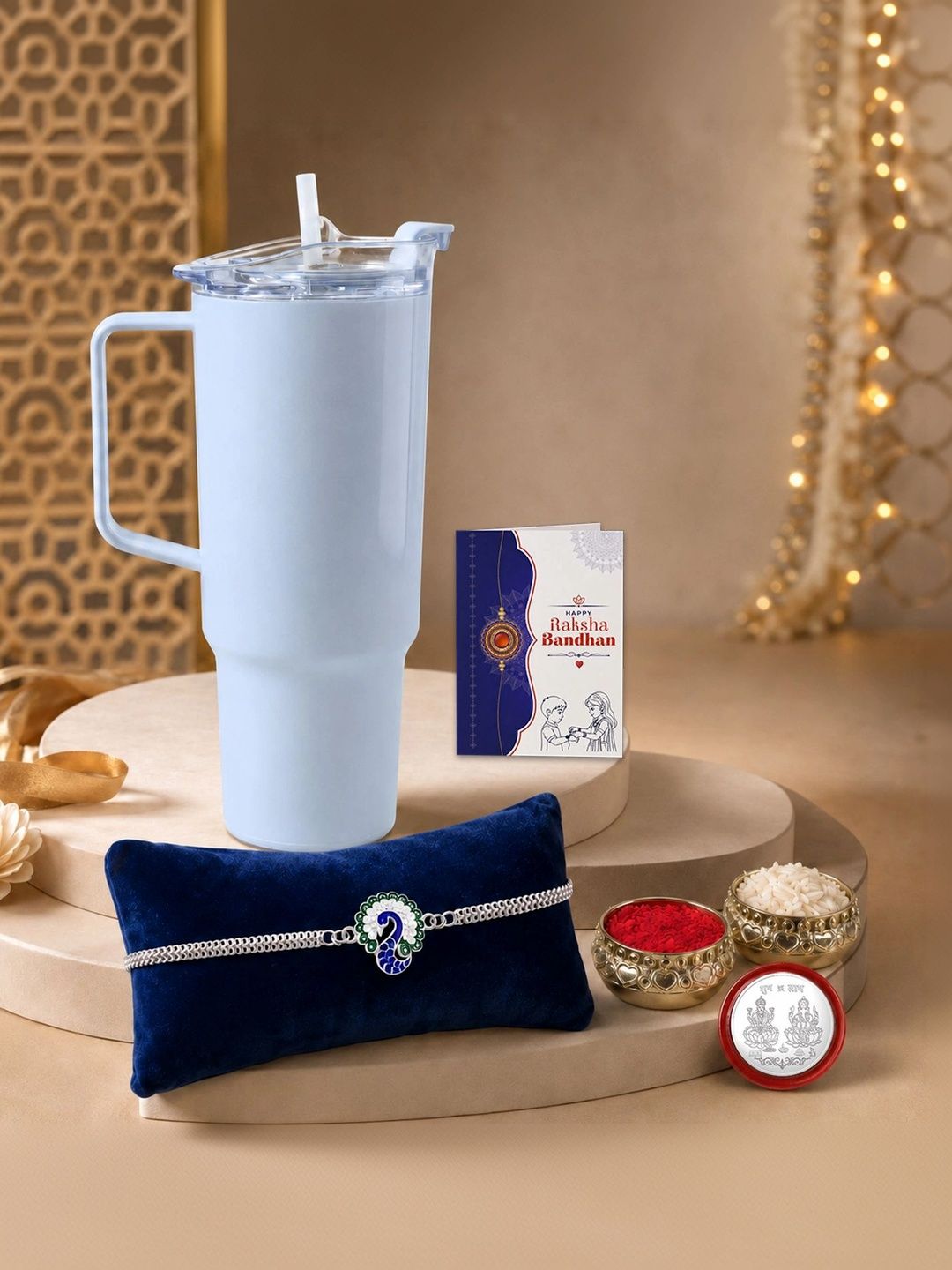 Myntra Elegant Homes Rakhi With Tumbler Silver Coin & Roli Chawal
