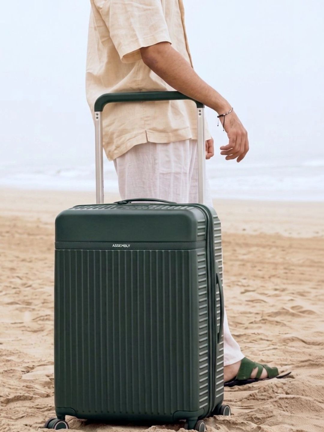 Assembly Rover Green Solid Polycarbonate Check-In Trolley Bag 70L deal from myntra
