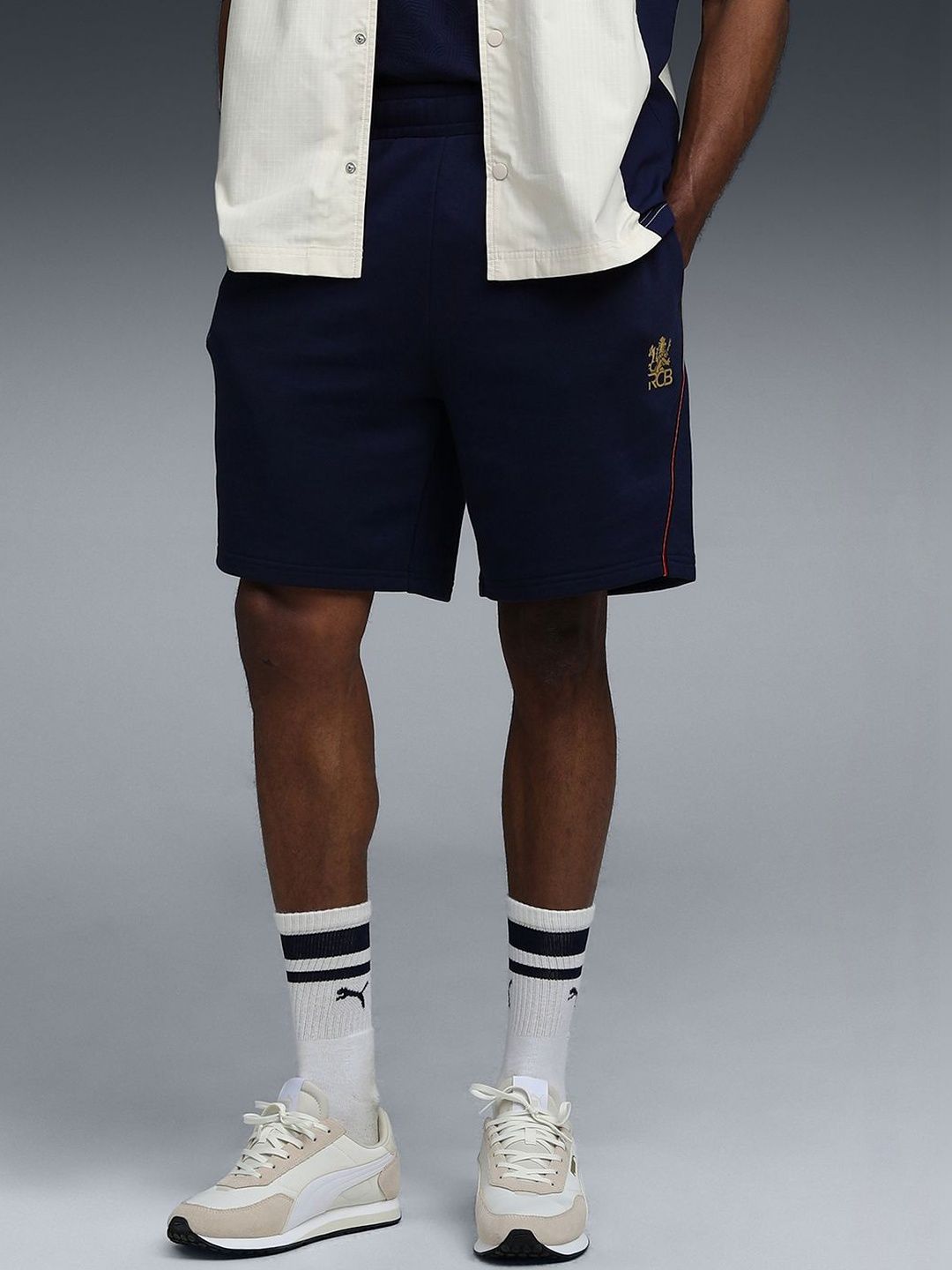 Puma x RCB 2026 Men Side Pocket Travel Shorts deal from myntra Puma x RCB 2026 Men Side Pocket Travel Shorts deal from myntra