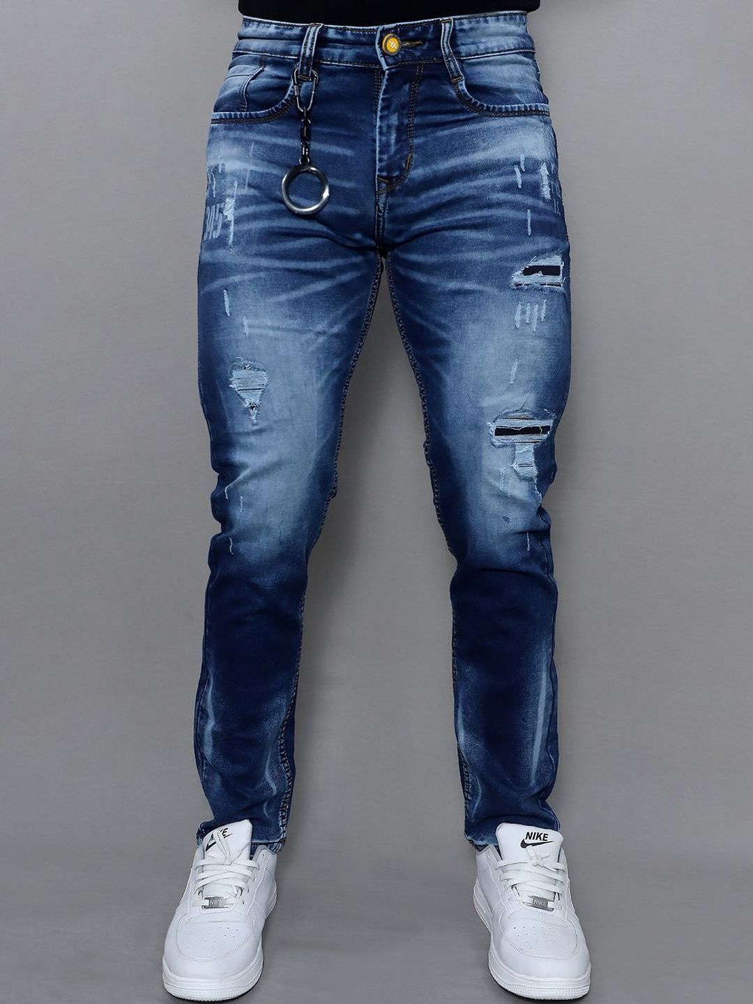 GEX Men Slim Fit Mid-Rise Mildly Distressed Light Fade Stretchable Jeans