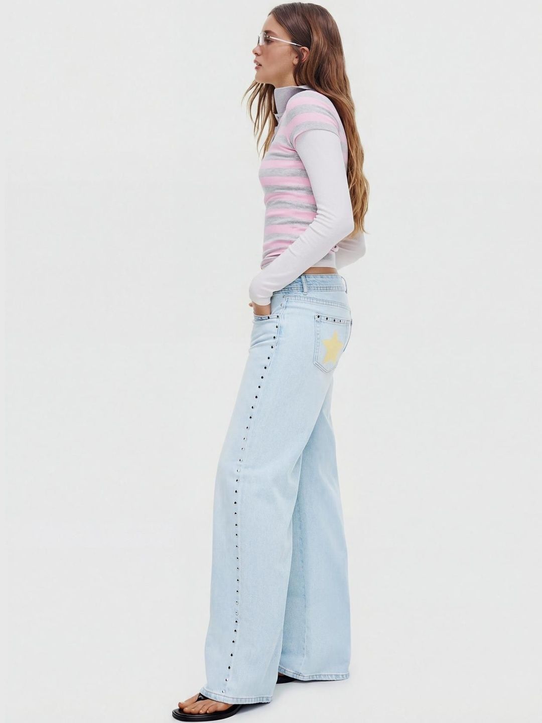 Low-rise baggy studded jeans