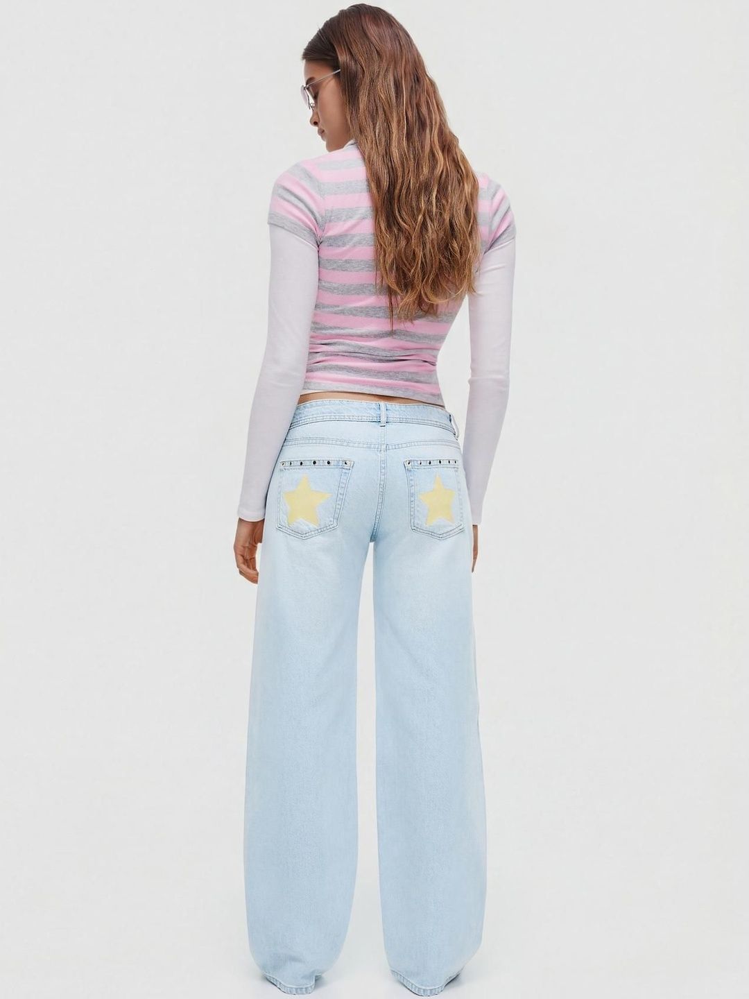 Low-rise baggy studded jeans