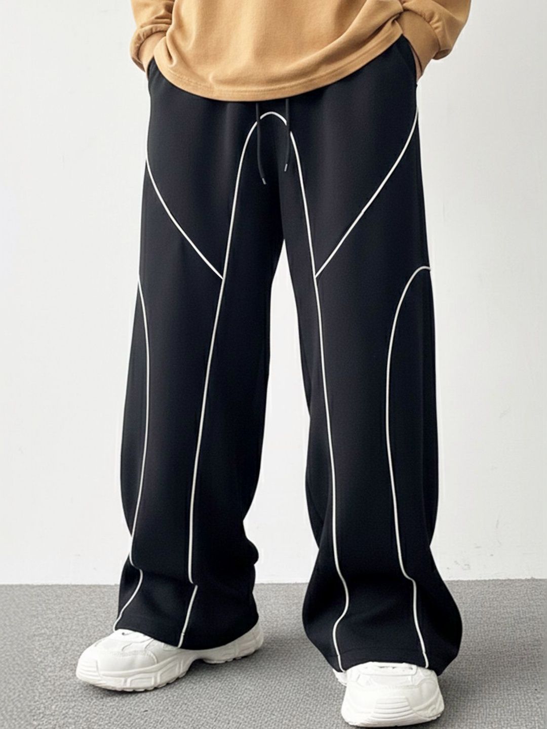 SZN Black Relaxed Fit Contrast Line Track Pants deal from myntra SZN Black Relaxed Fit Contrast Line Track Pants deal from myntra