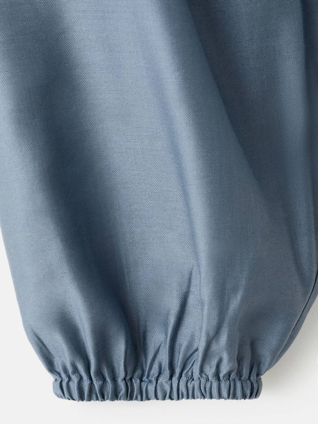 Embroidered Tie-Up Neck Top