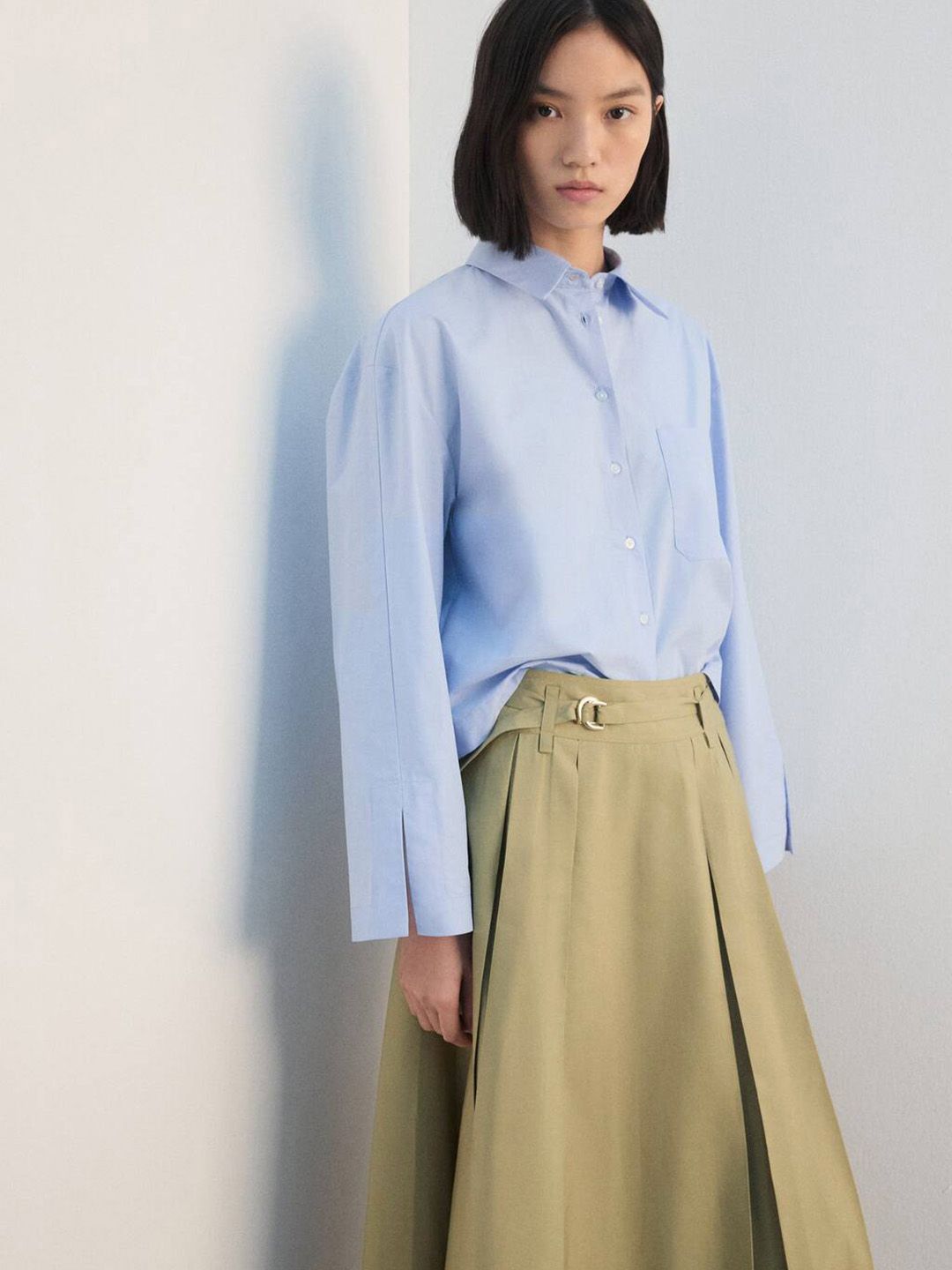 High-Rise Pleated Midi Skirt with a Buckle Detail
