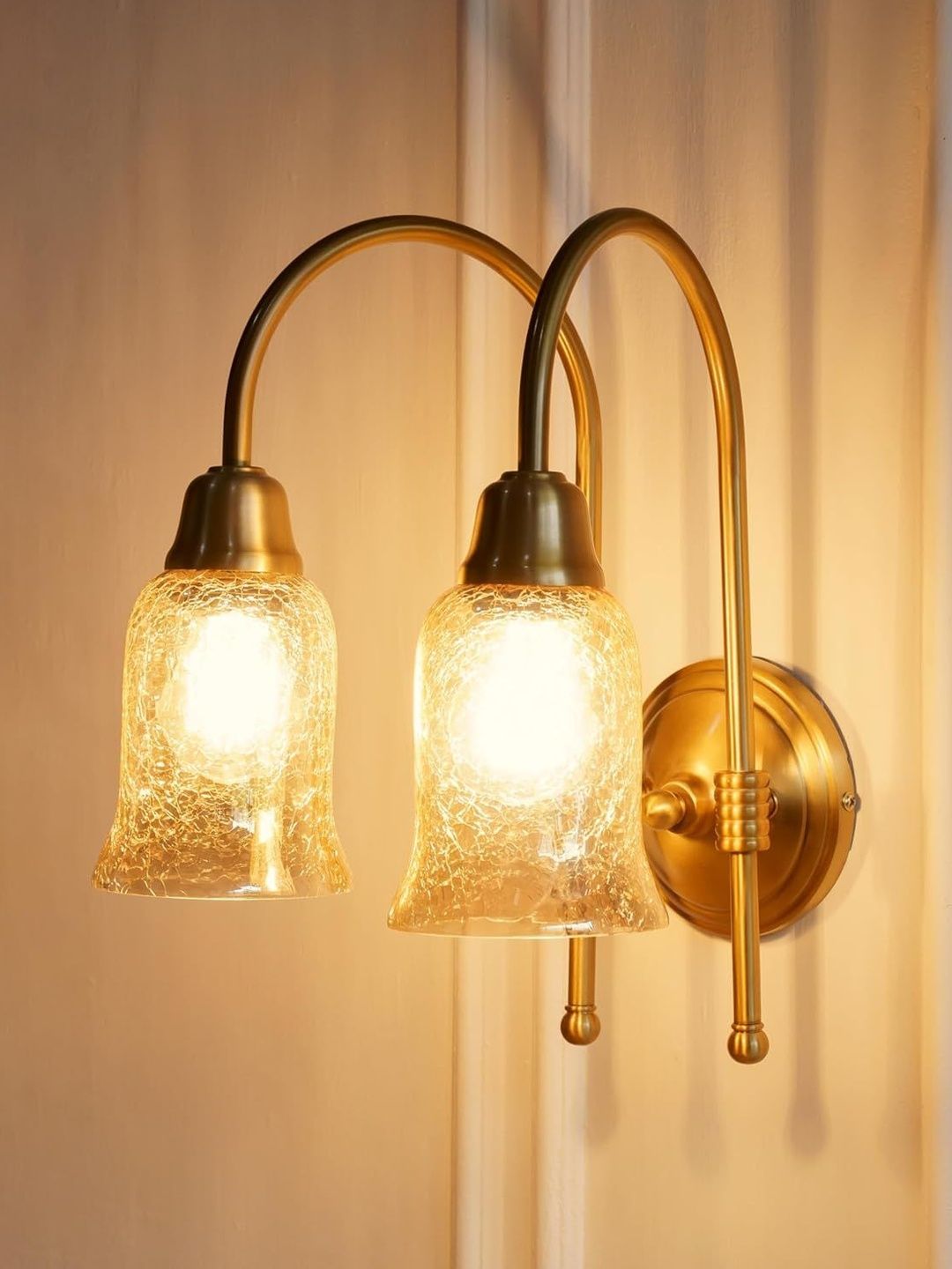 Divine Trends Double Hockey Brass Antique Finish Wall Lamp with Golden Glass