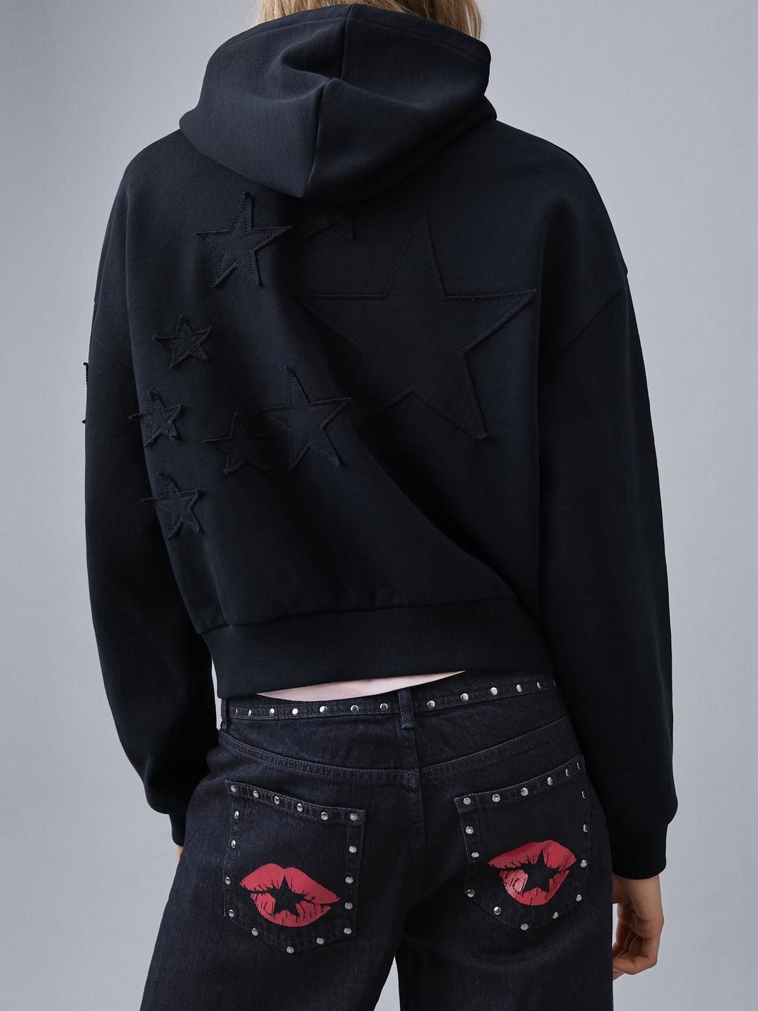 Low-rise baggy studded jeans