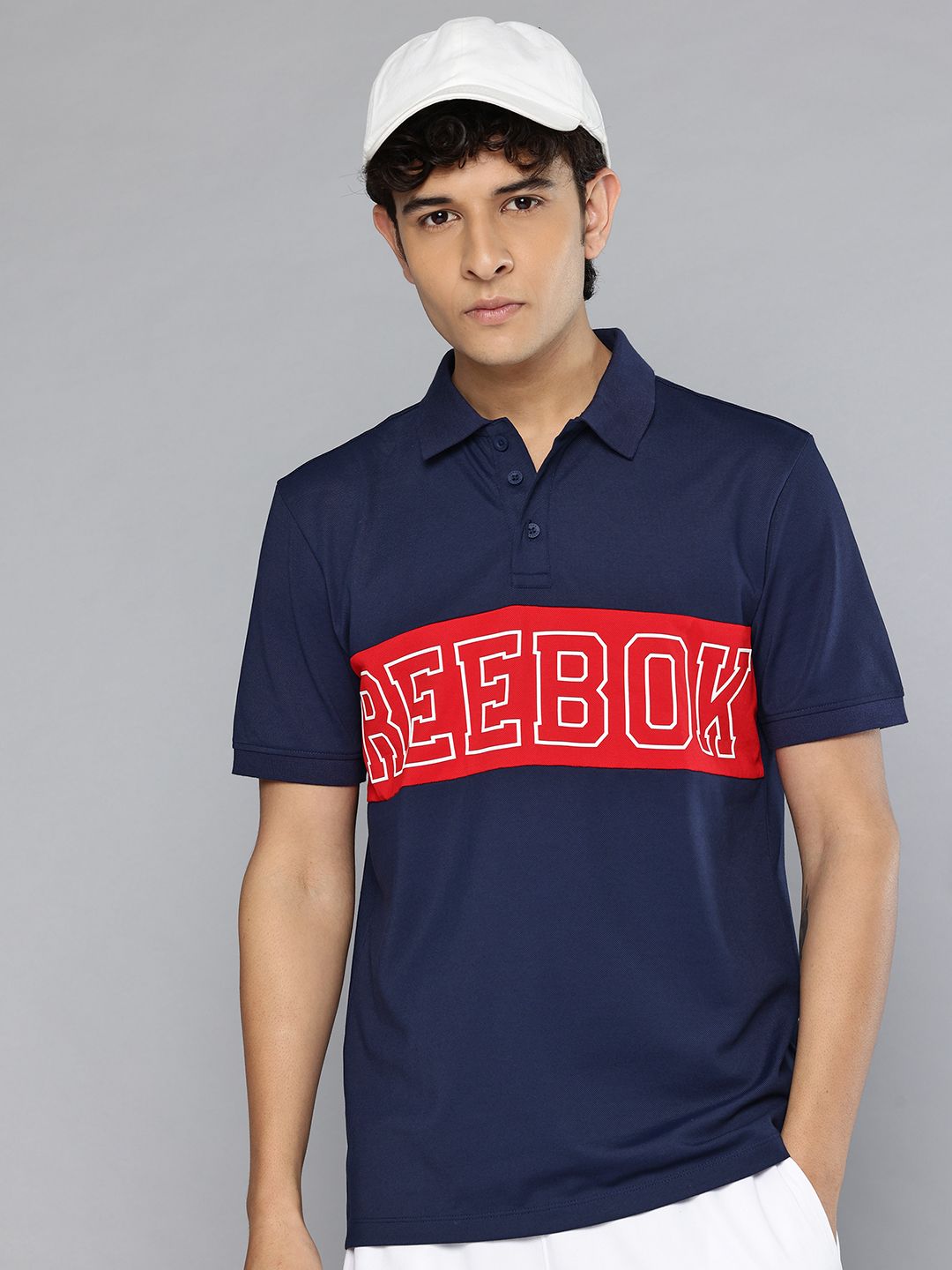 Reebok Men Brand Logo Printed Contrast Cut and Sew Polo T-shirt