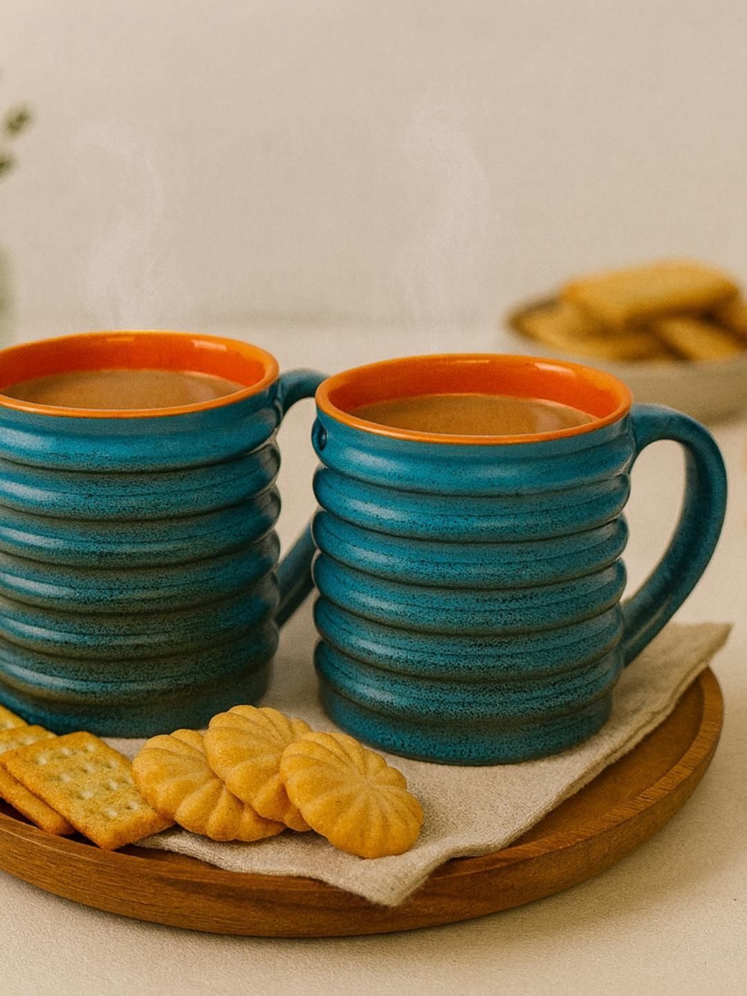 Unravel India Blue Crafted Ceramics Solid Ceramic Glossy Mugs Set of Cups and Mugs