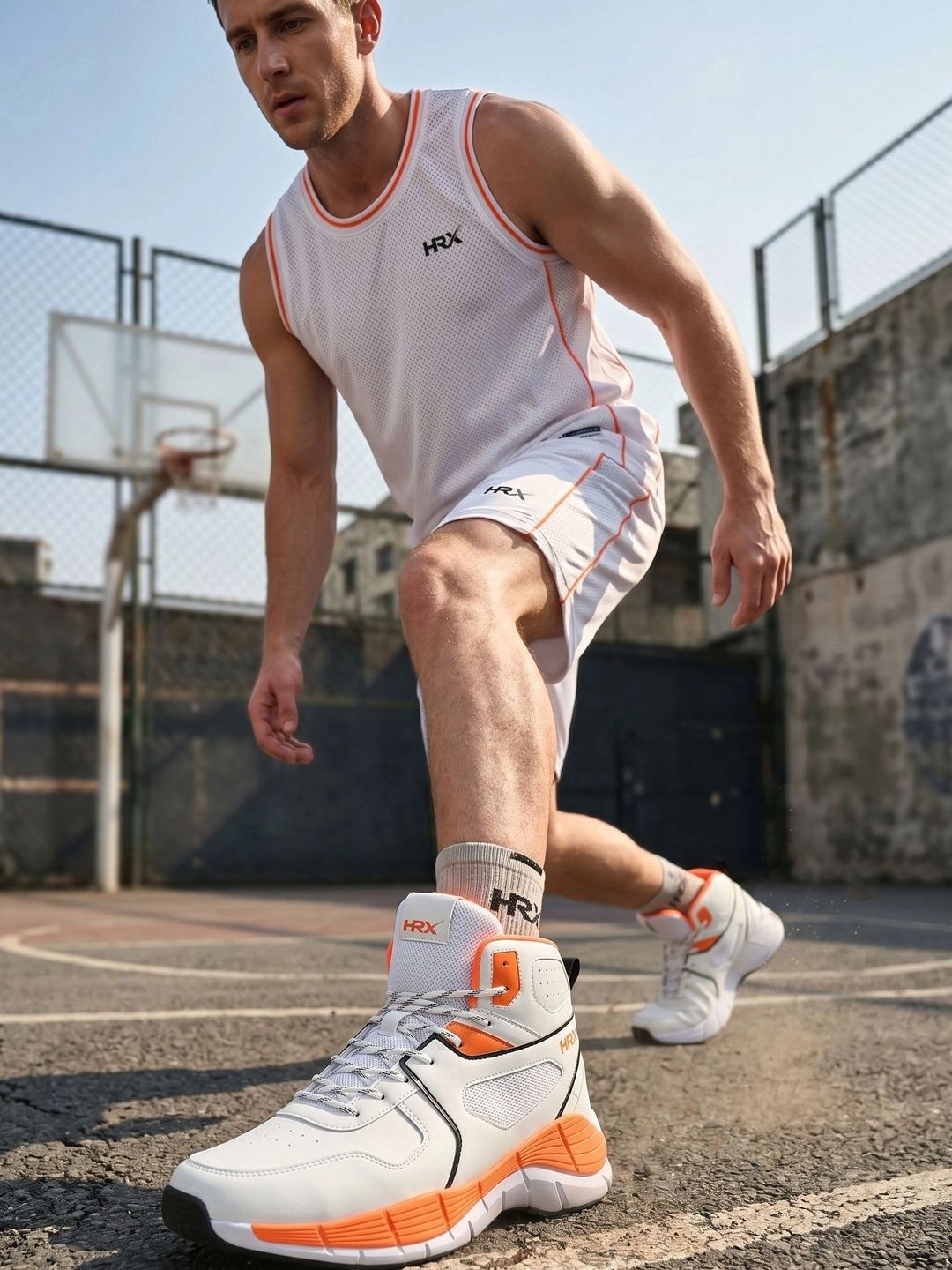 HRX by Hrithik Roshan Men Off White & Orange Rebound Mid Top Perforations Comfort Sneakers